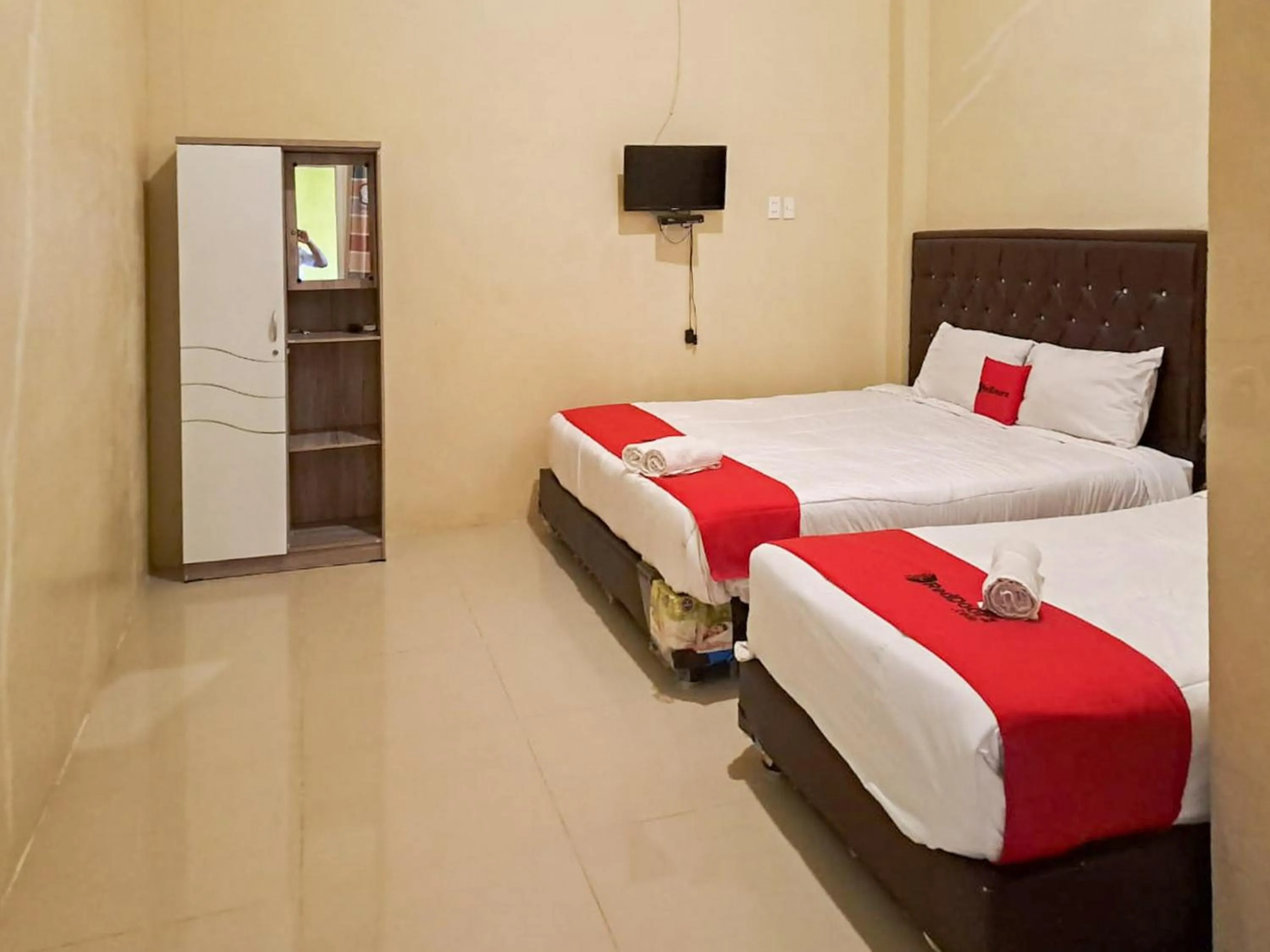 Bed in RedDoorz Syariah At Harley Hotel Sabang