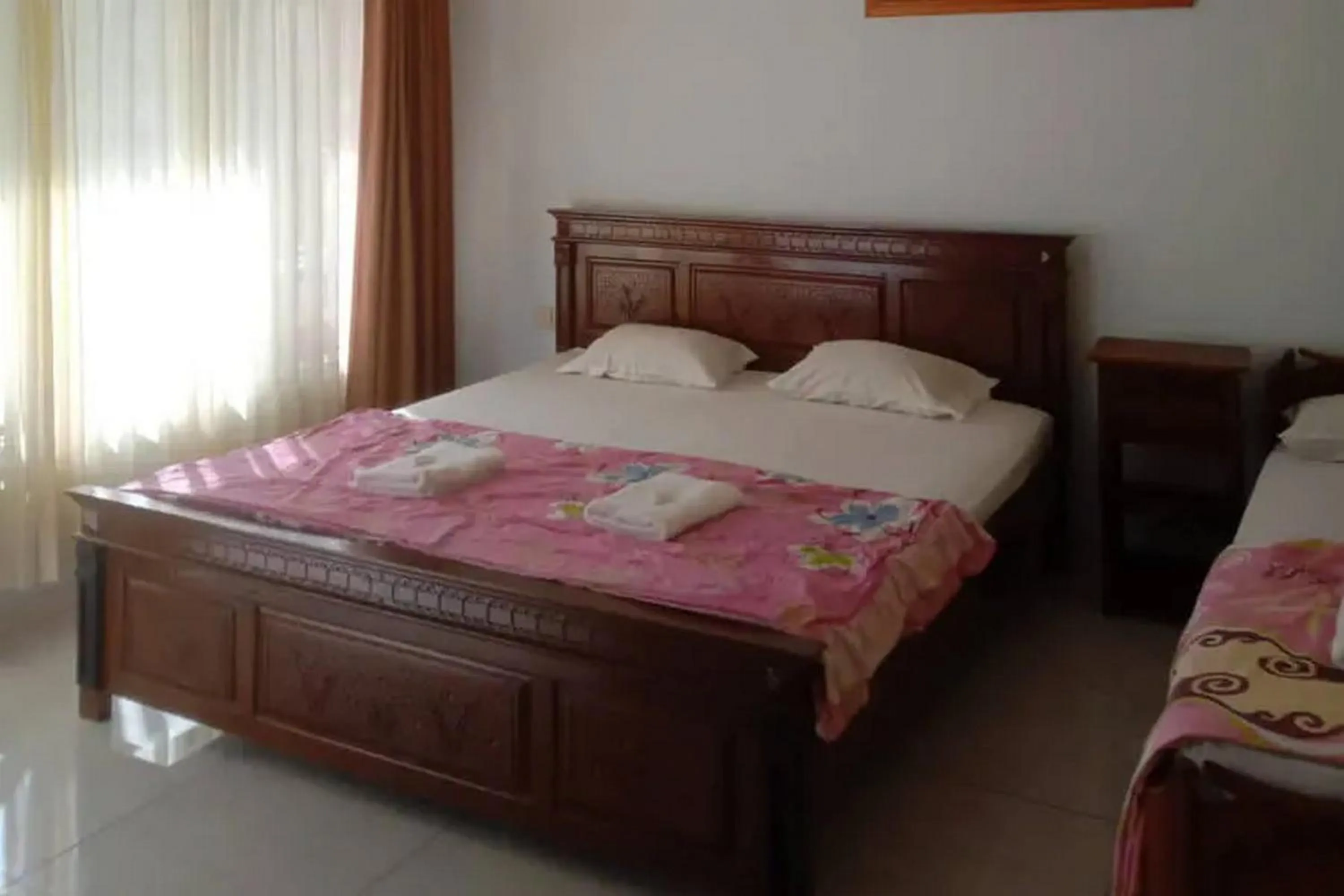 Bed in Puri Karimunjawa RedPartner