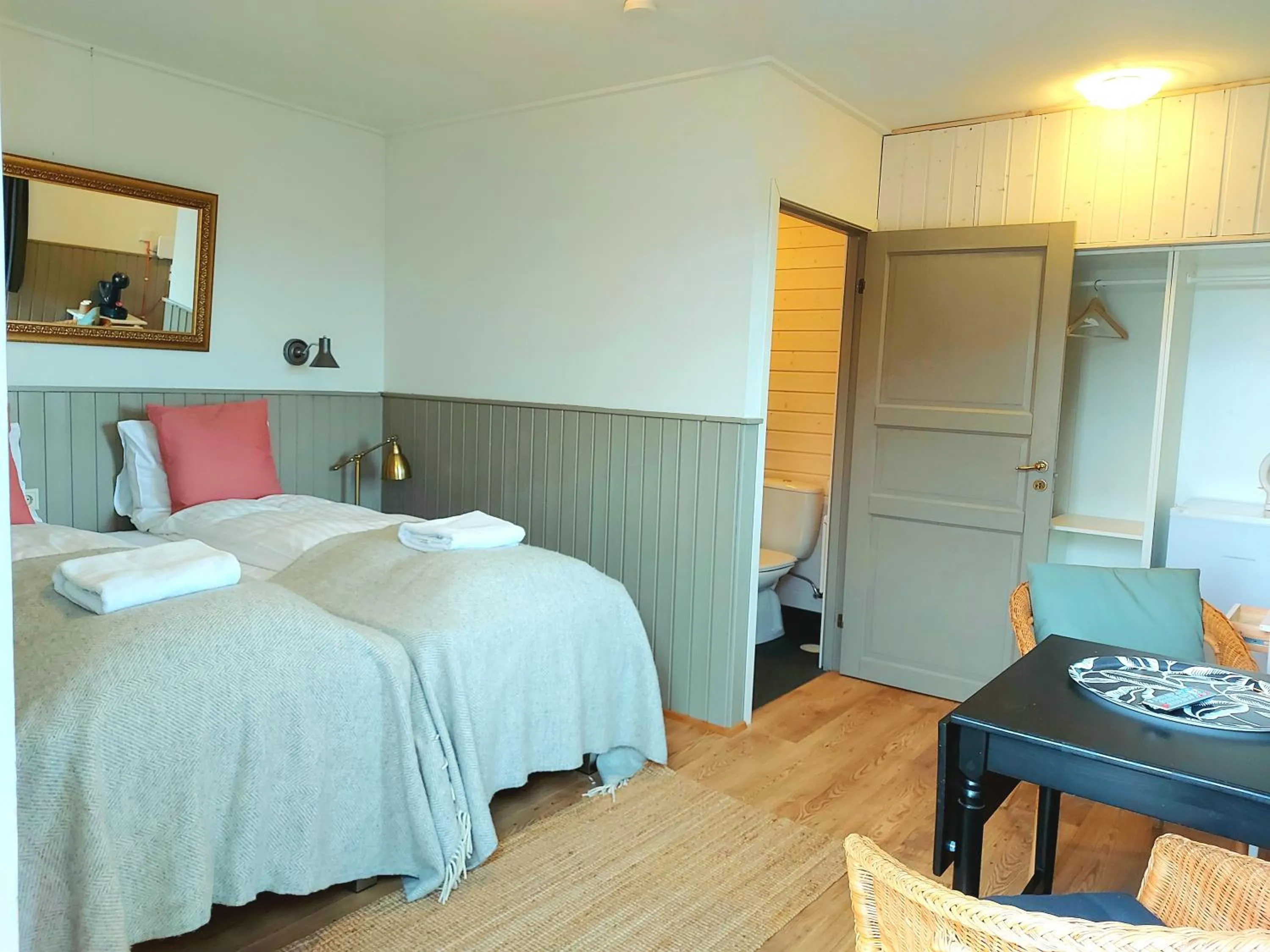 Bed in Riverfront Lodge Hella