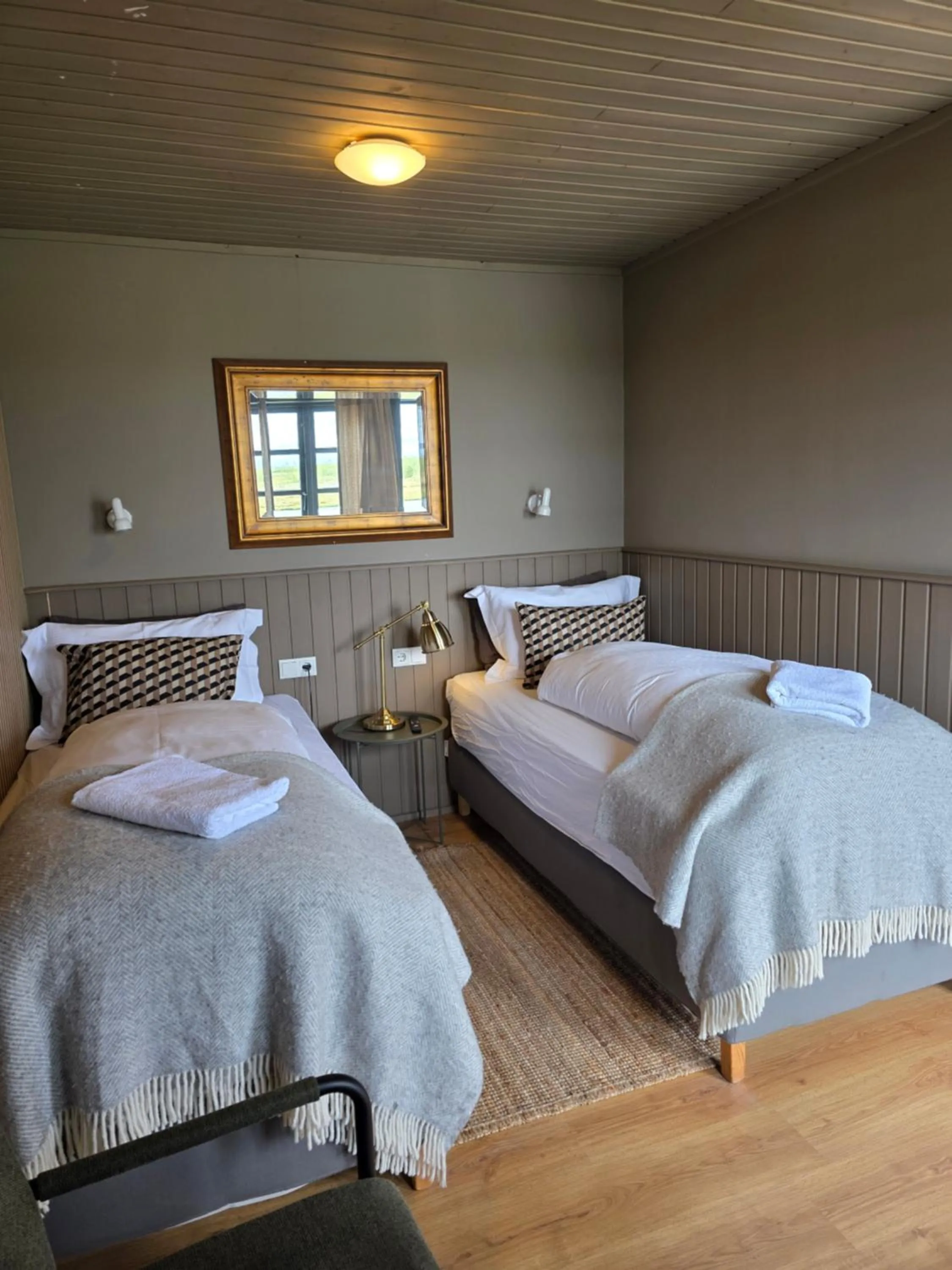 Bedroom, Bed in Riverfront Lodge Hella