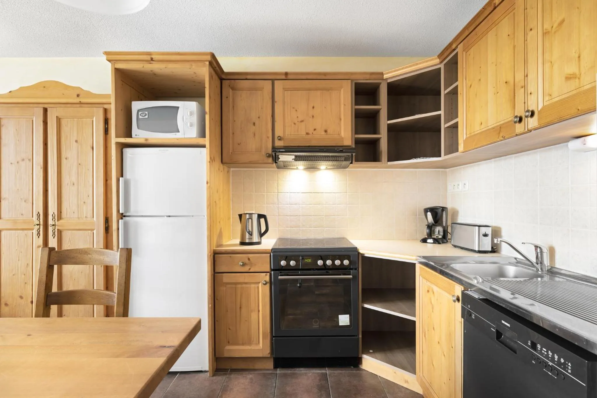 Kitchen or kitchenette in Résidence Les Balcons de La Rosière
