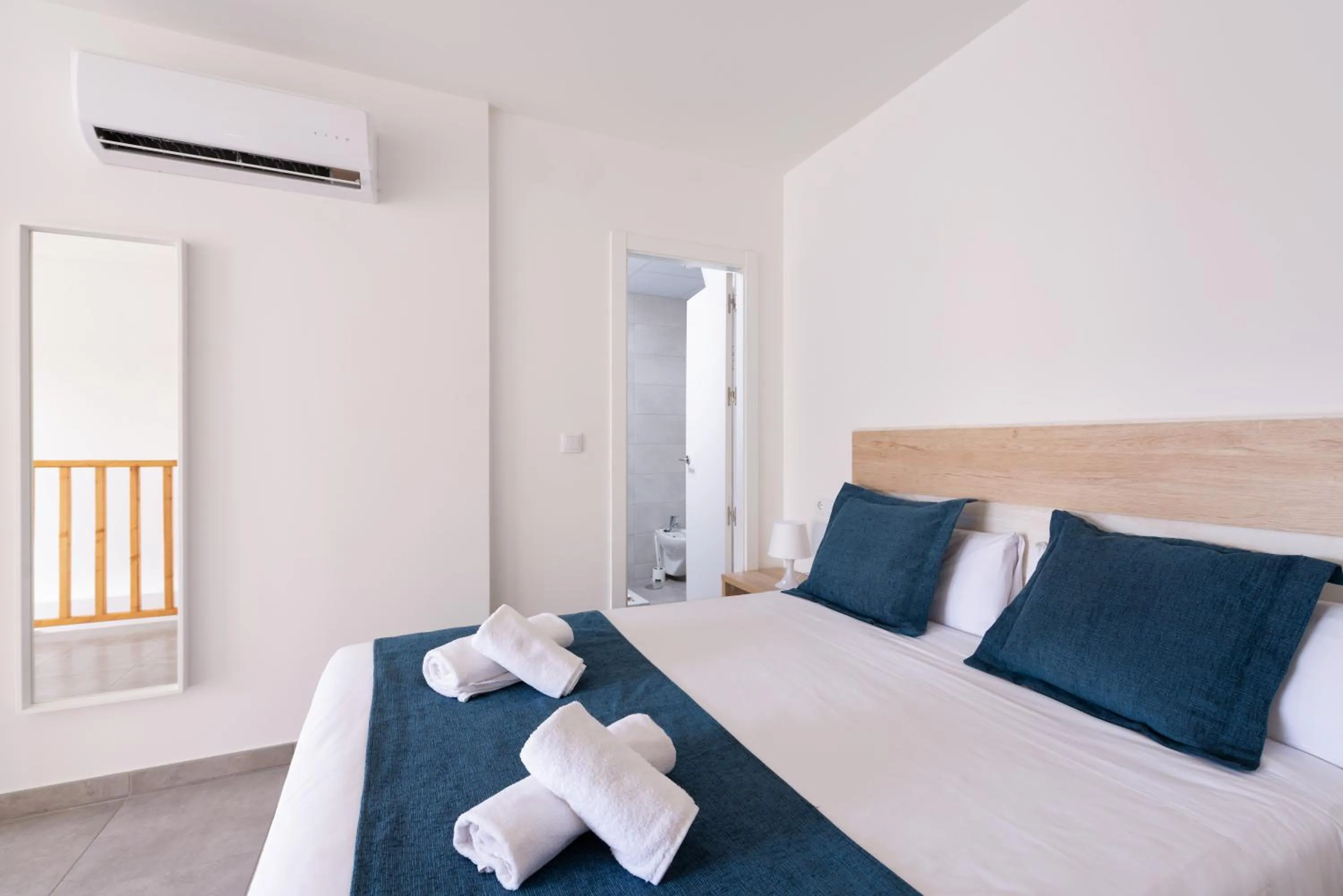 Bed in Apartamentos Quijano by Be Alicante