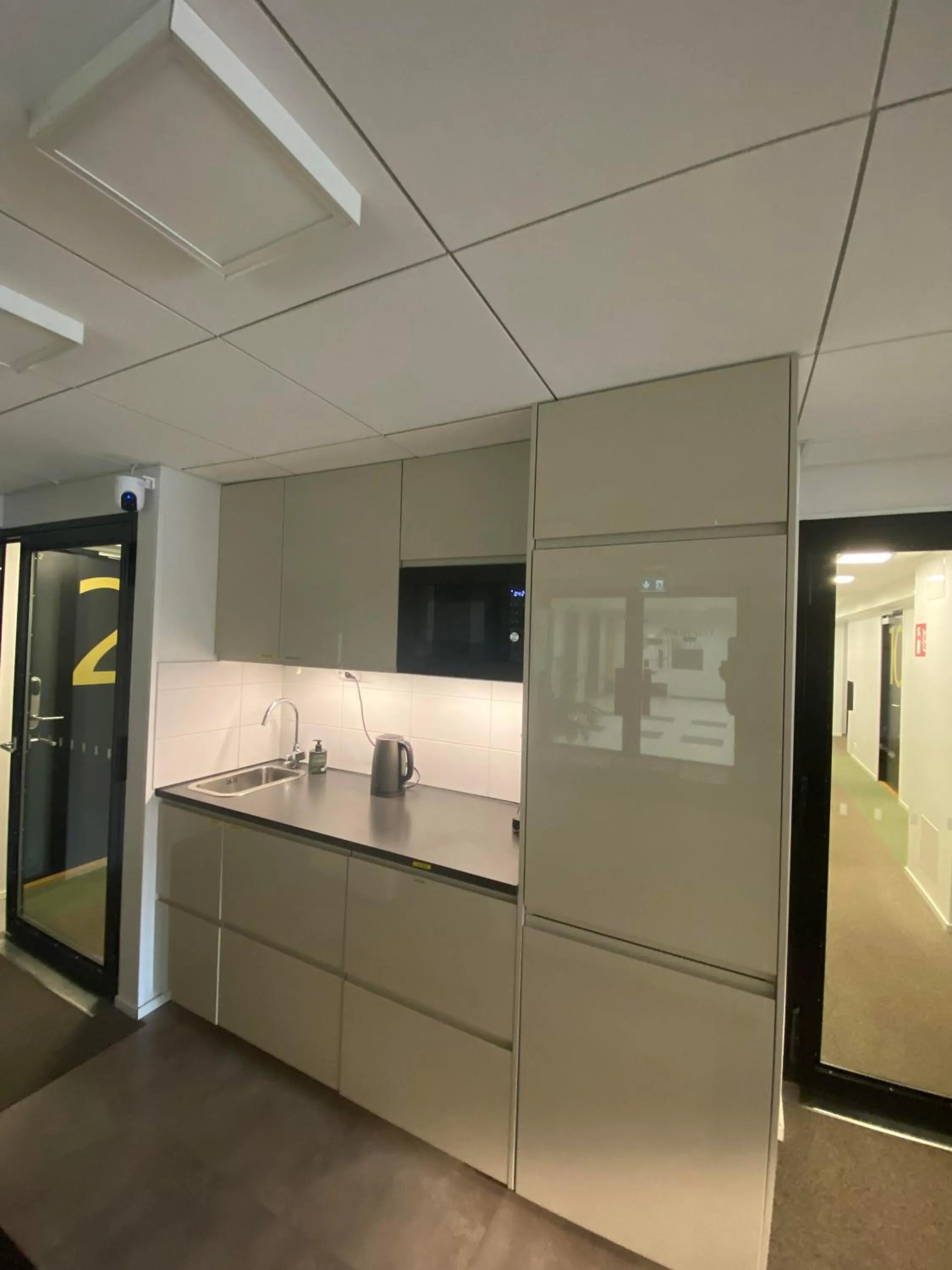 Communal kitchen in Aikatalo Hostel Helsinki