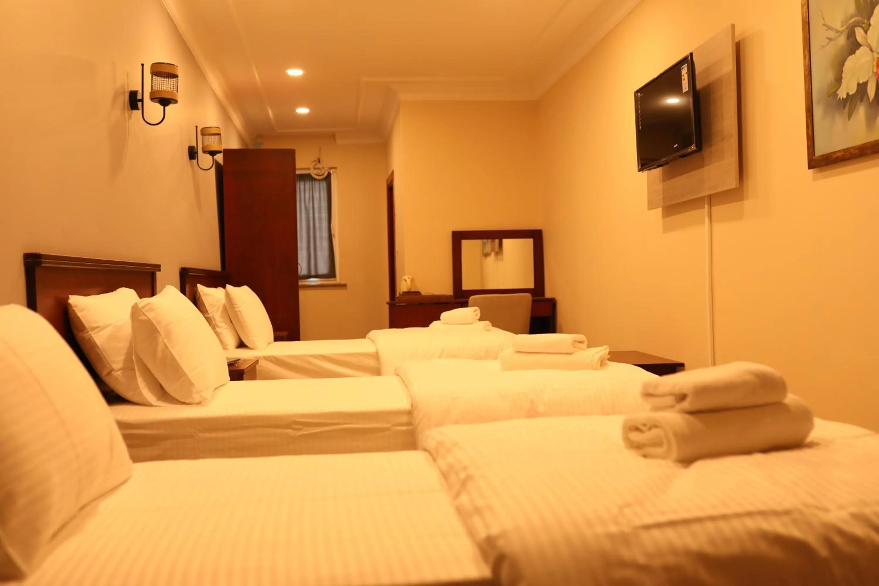 Bed in Marina Park Hotel