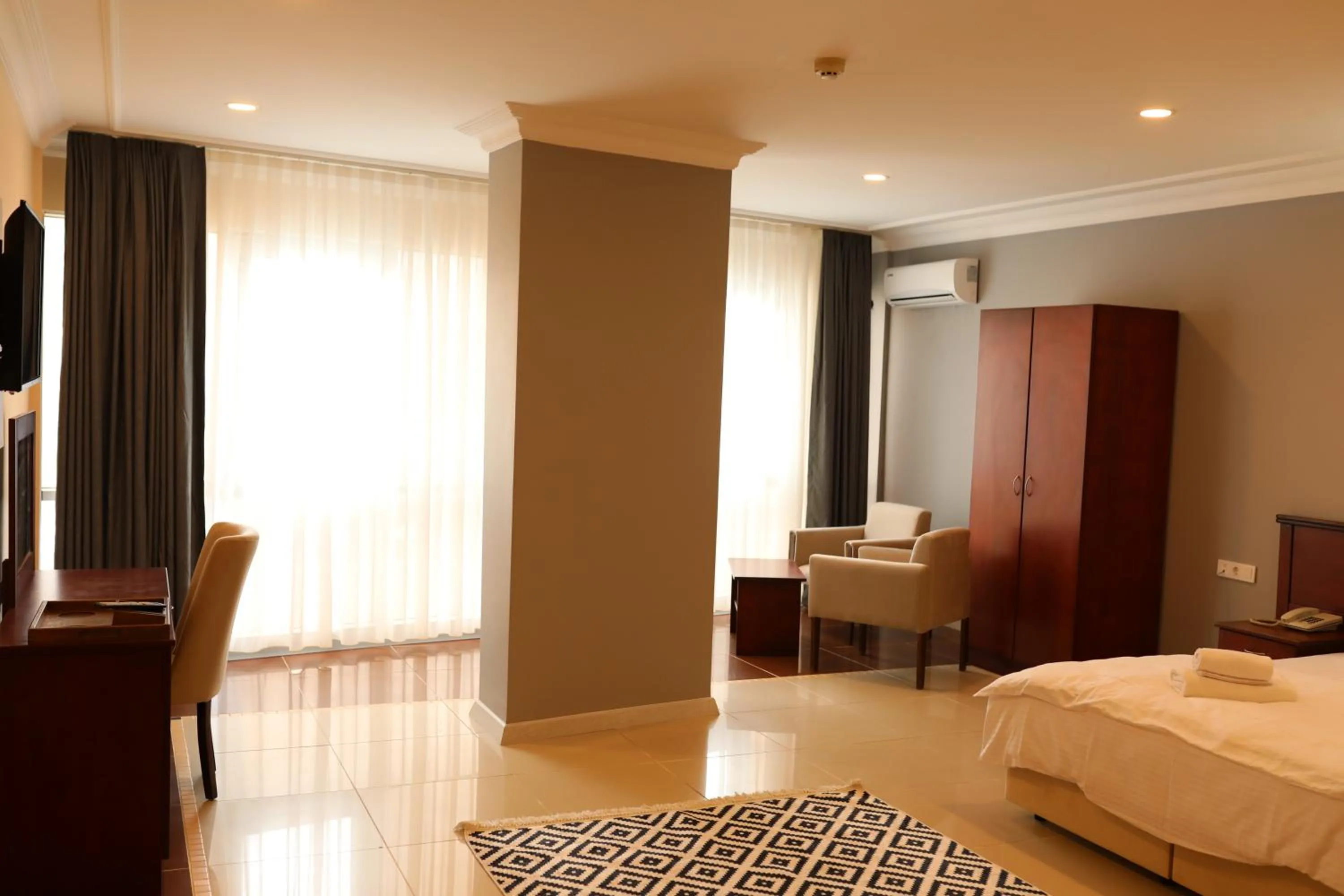 Bed in Marina Park Hotel