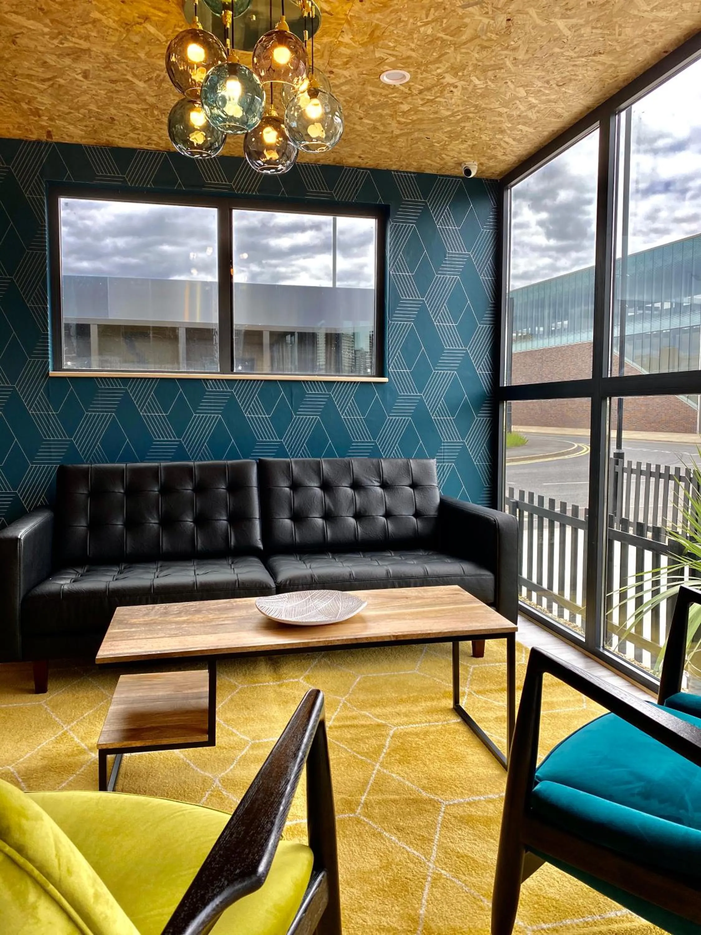 Communal lounge/ TV room in Snoozebox Olympic Park