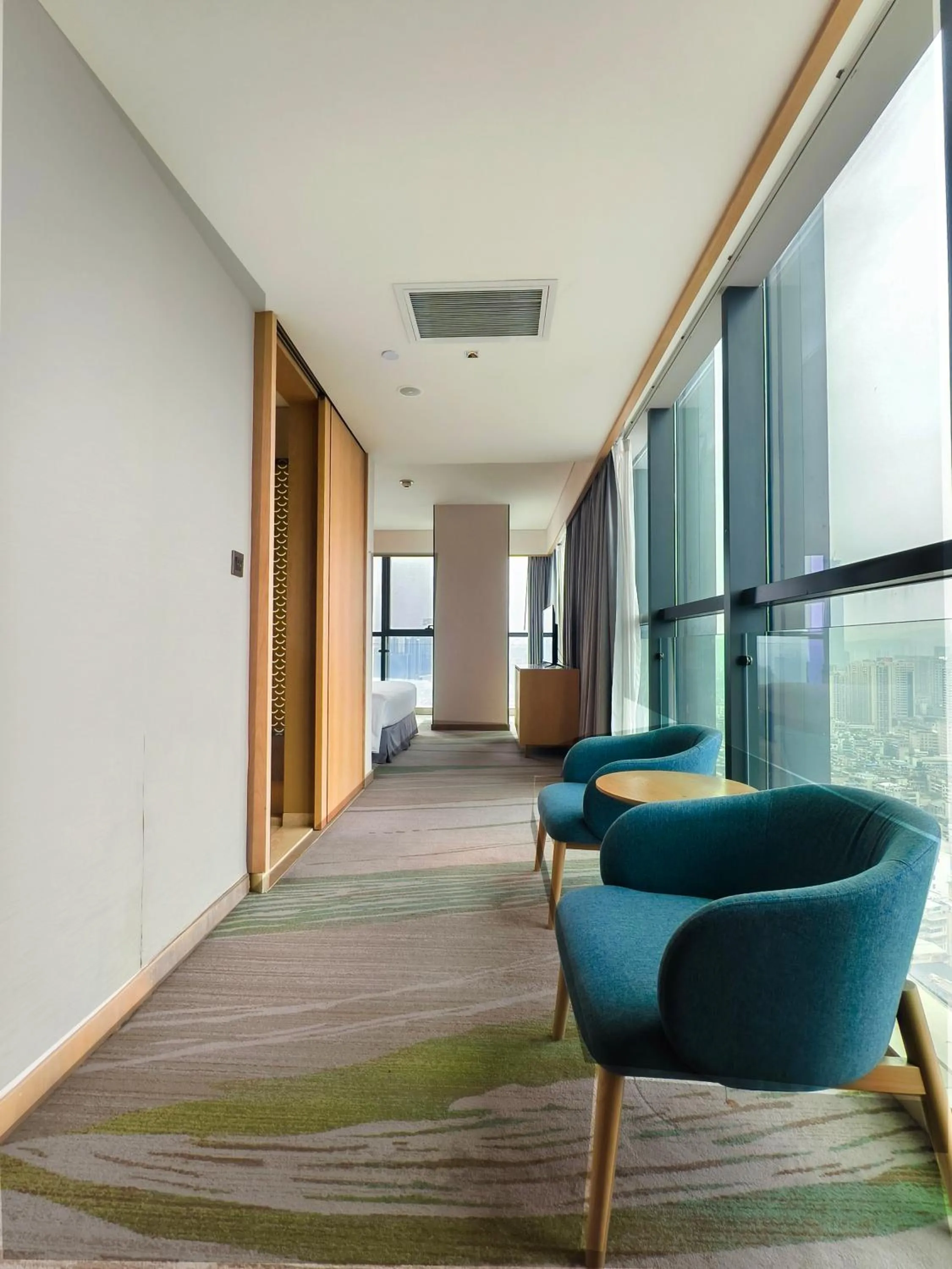 Seating area in Holiday Inn Guiyang City Center by IHG