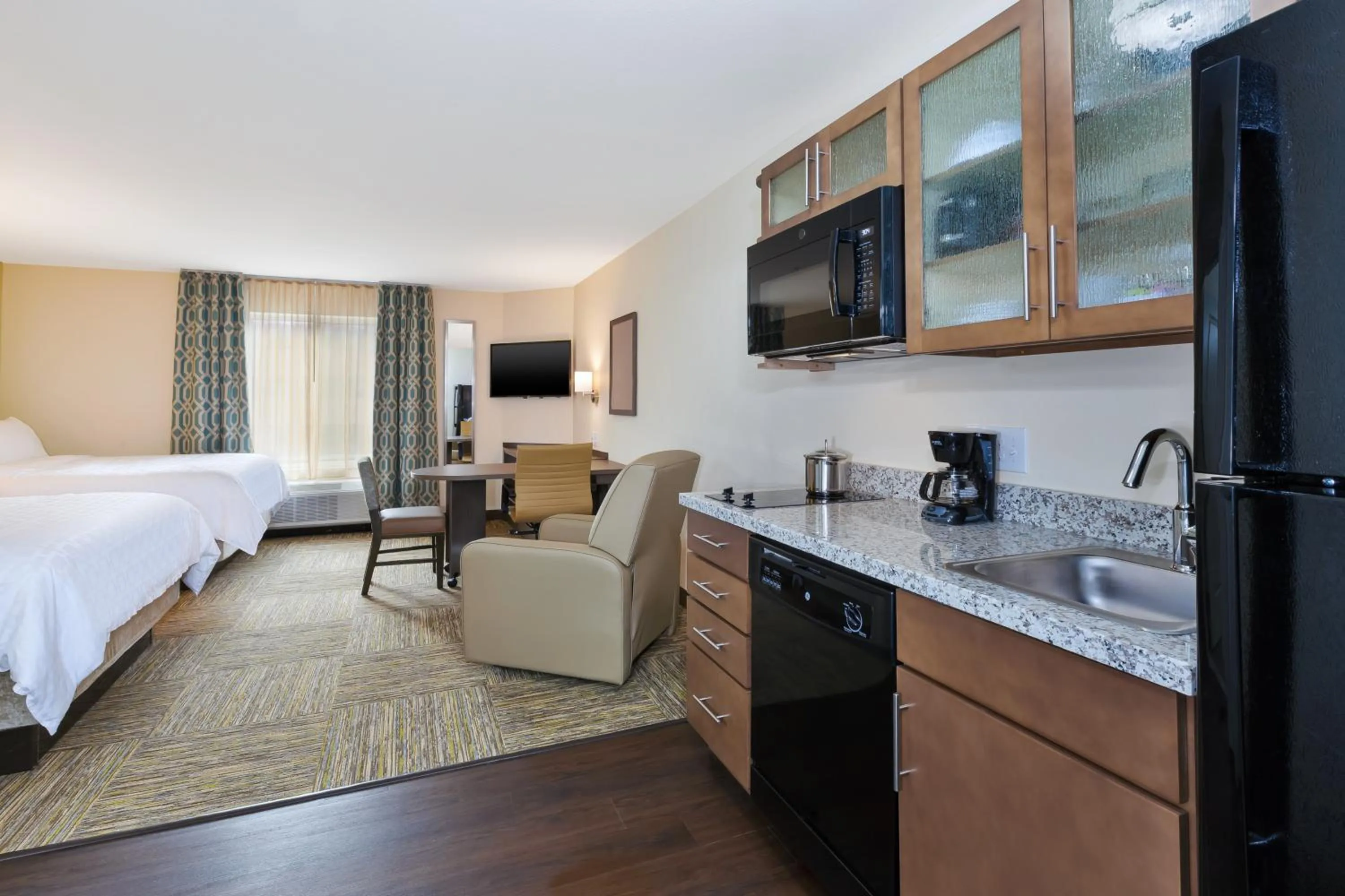 Bed in Candlewood Suites Louisville - NE Downtown Area by IHG