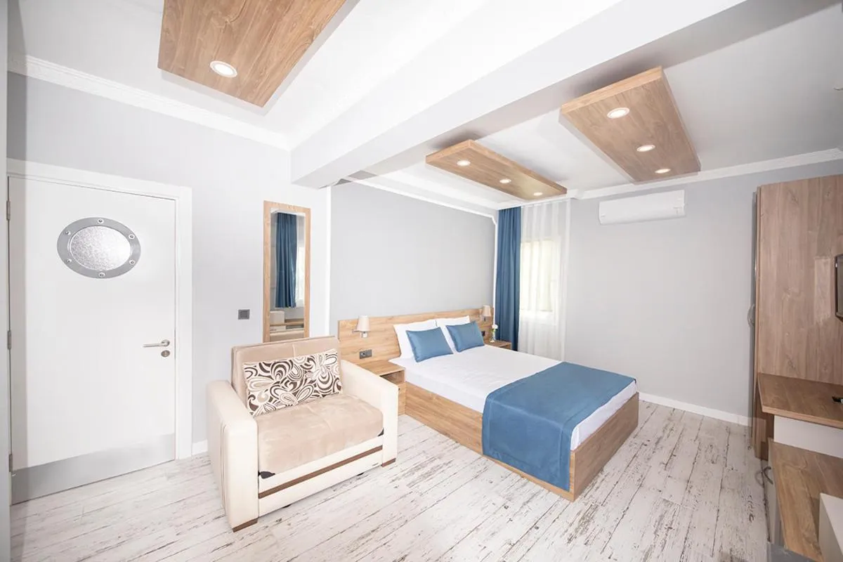 Photo of the whole room, Bed in Marina Hotel Bodrum