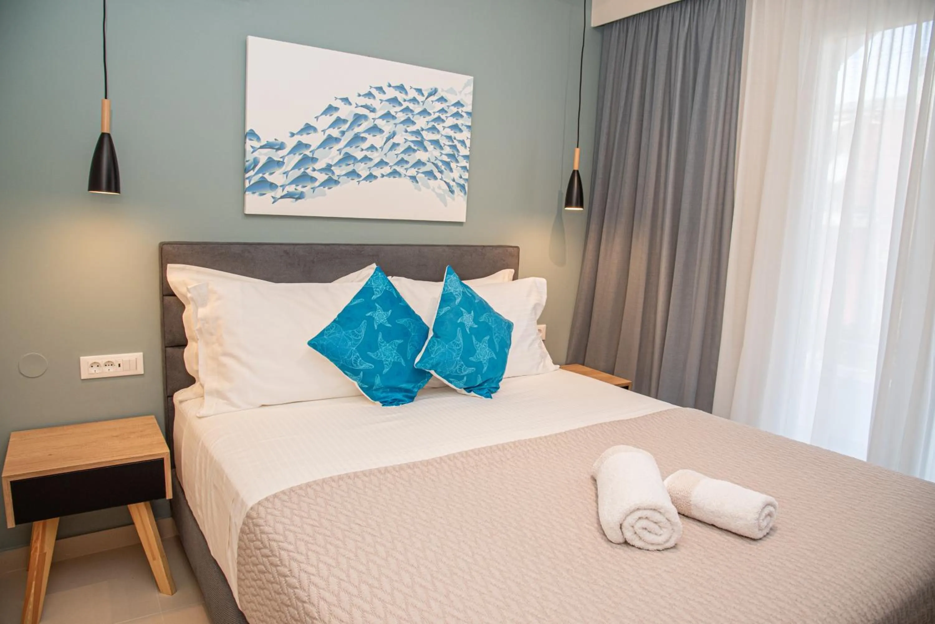 Bed in Kassiopi Luxury Suites