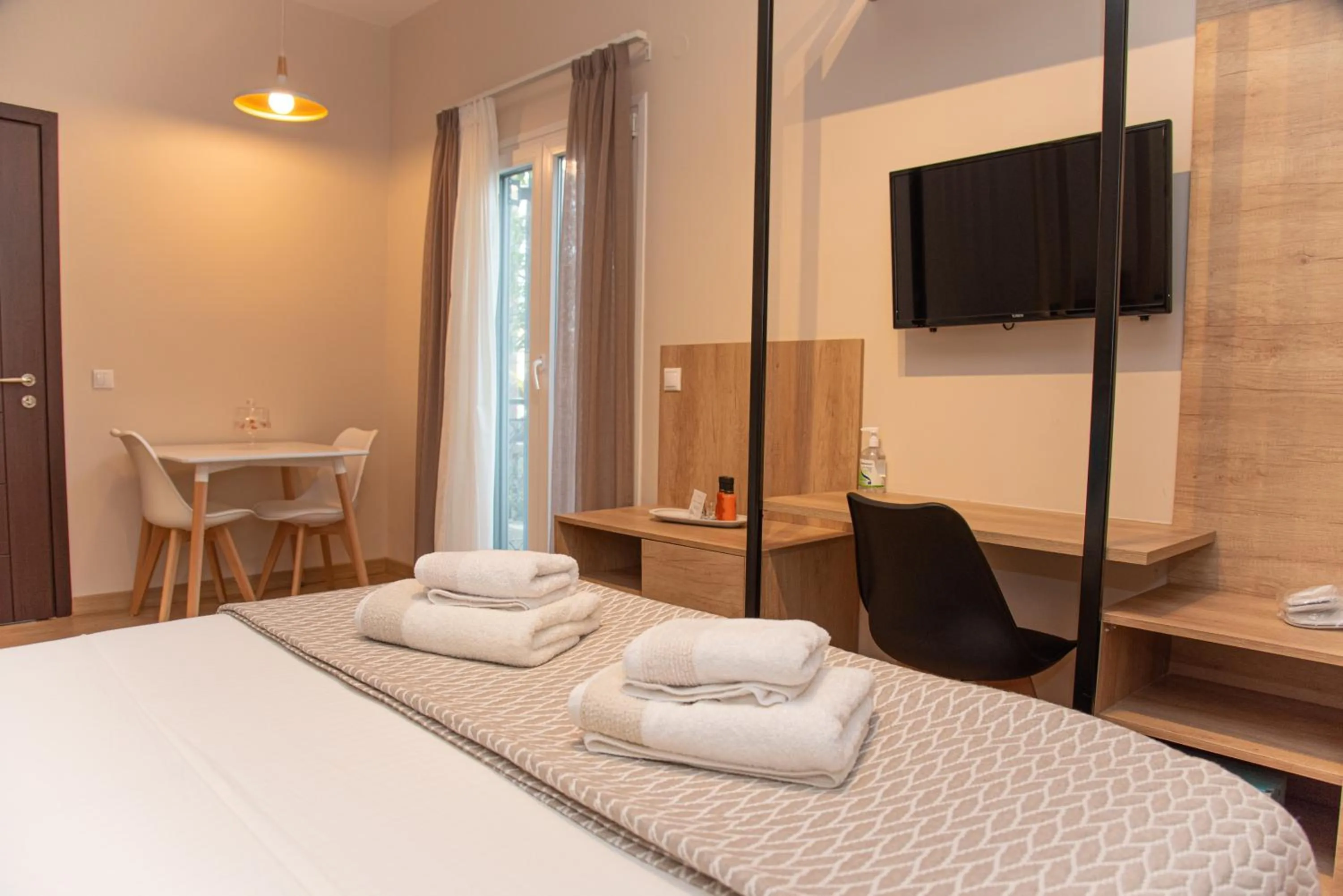 Bed in Kassiopi Luxury Suites