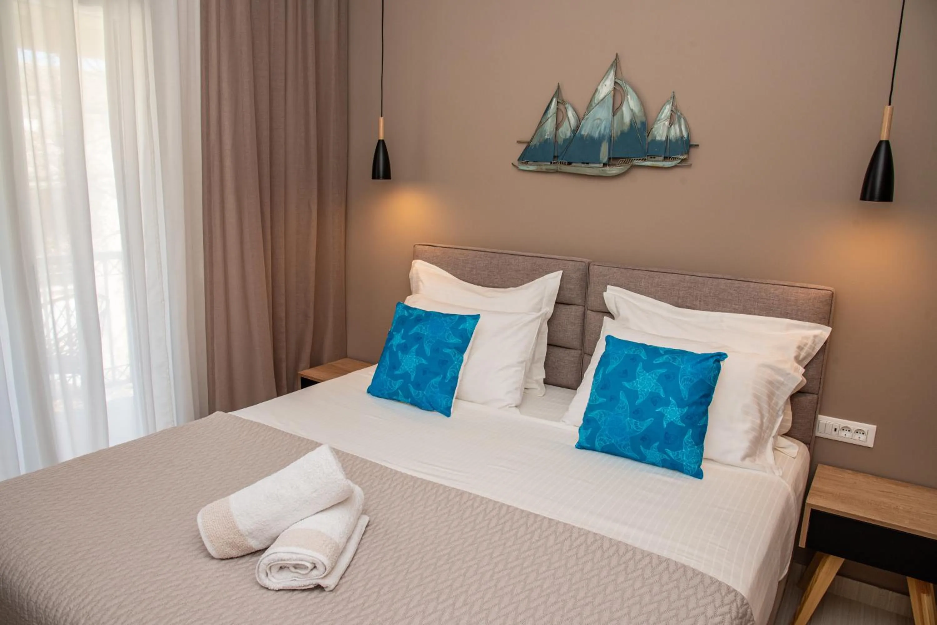 Bed in Kassiopi Luxury Suites