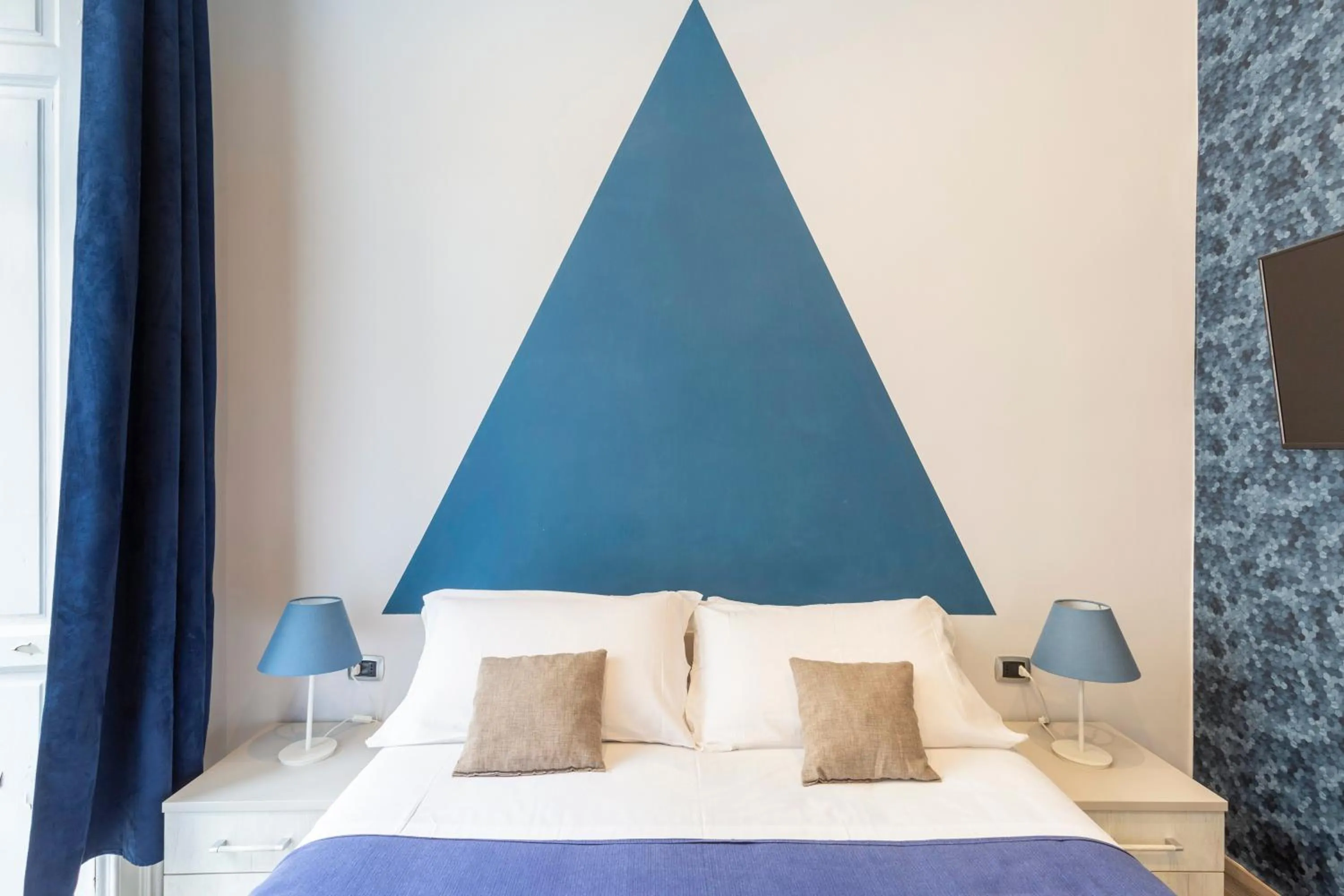 Bed in Scaramantico Rooms