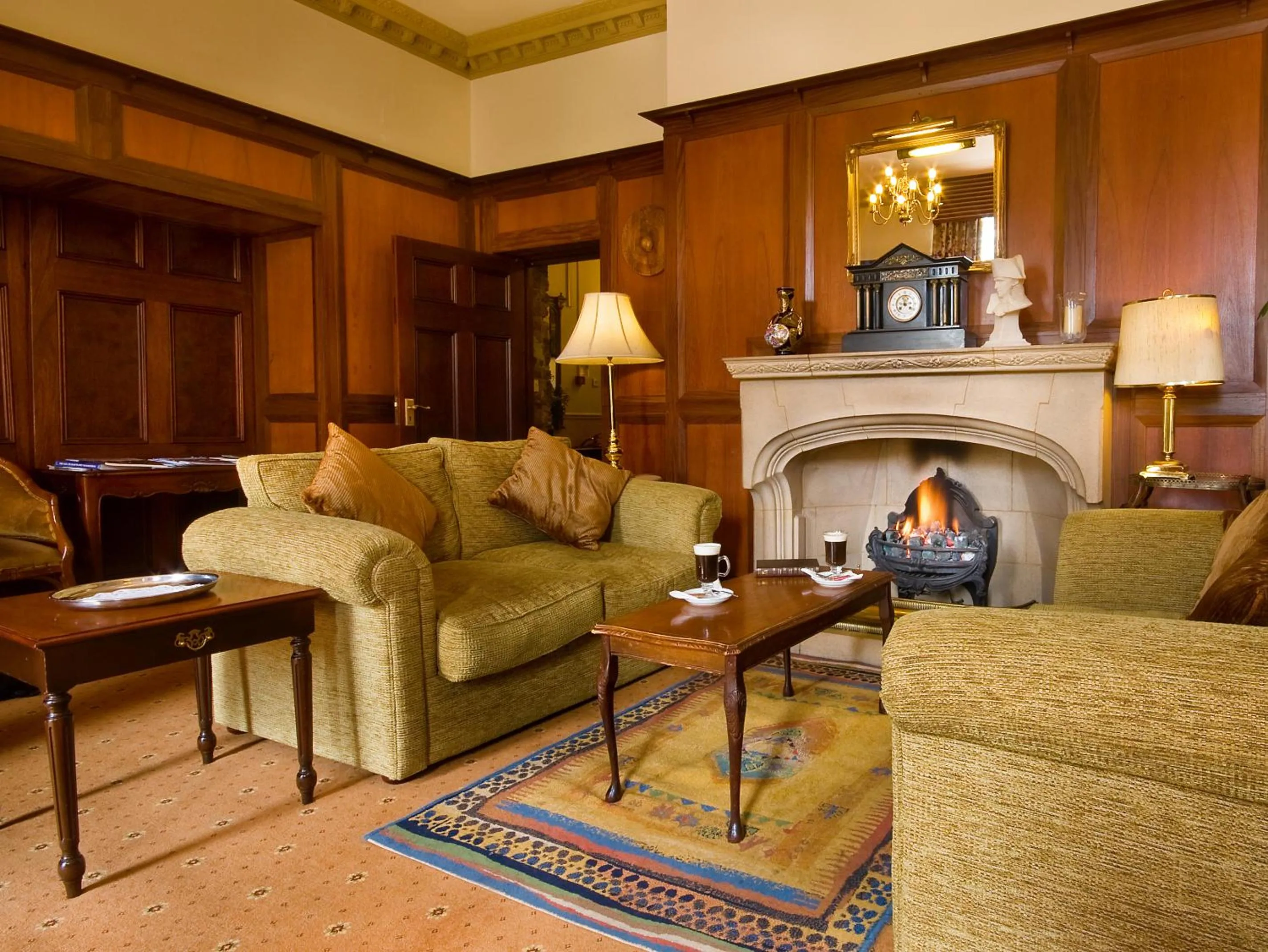 Communal lounge/ TV room in Berry Head Hotel