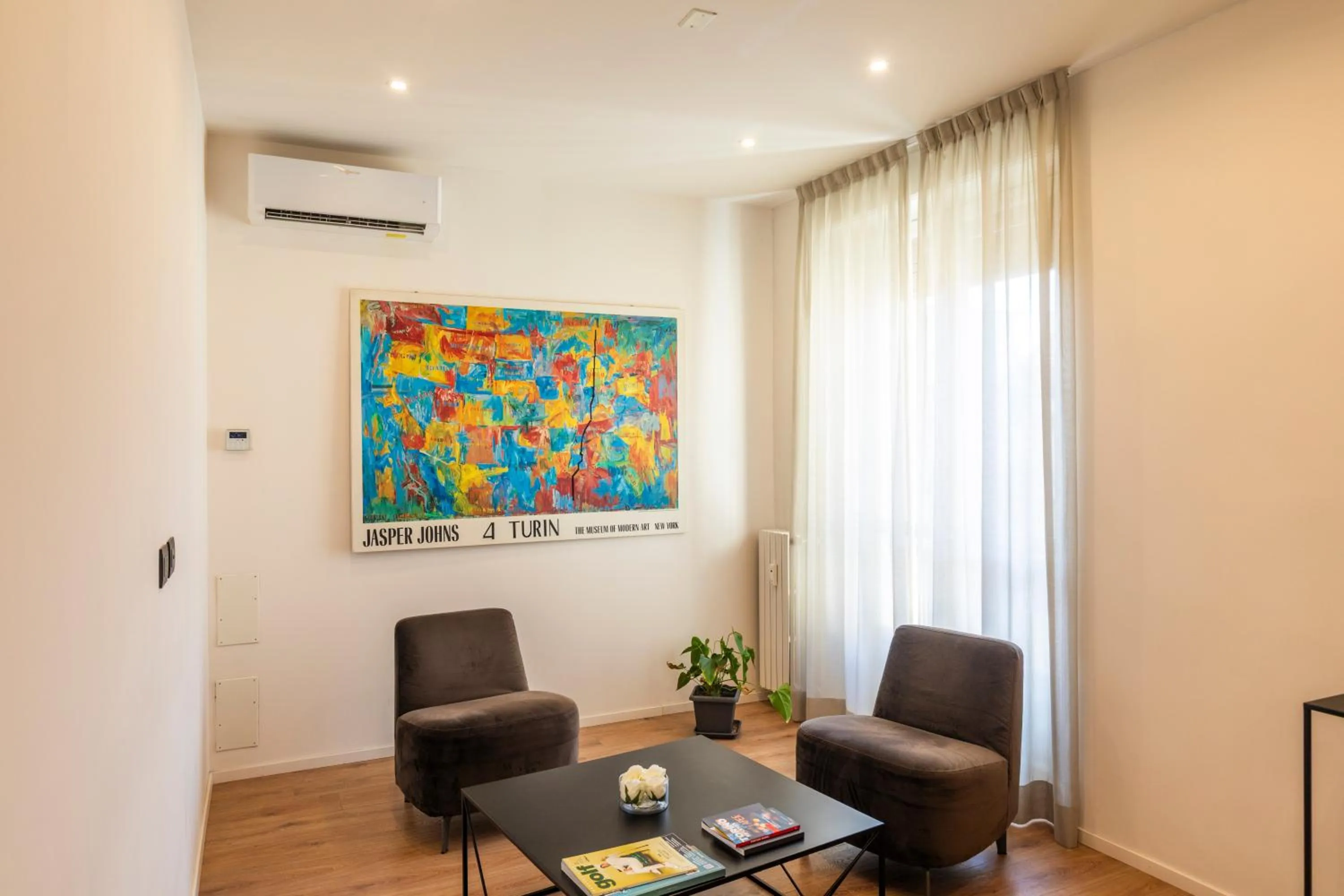 Communal lounge/ TV room in San Carlo Suite Torino