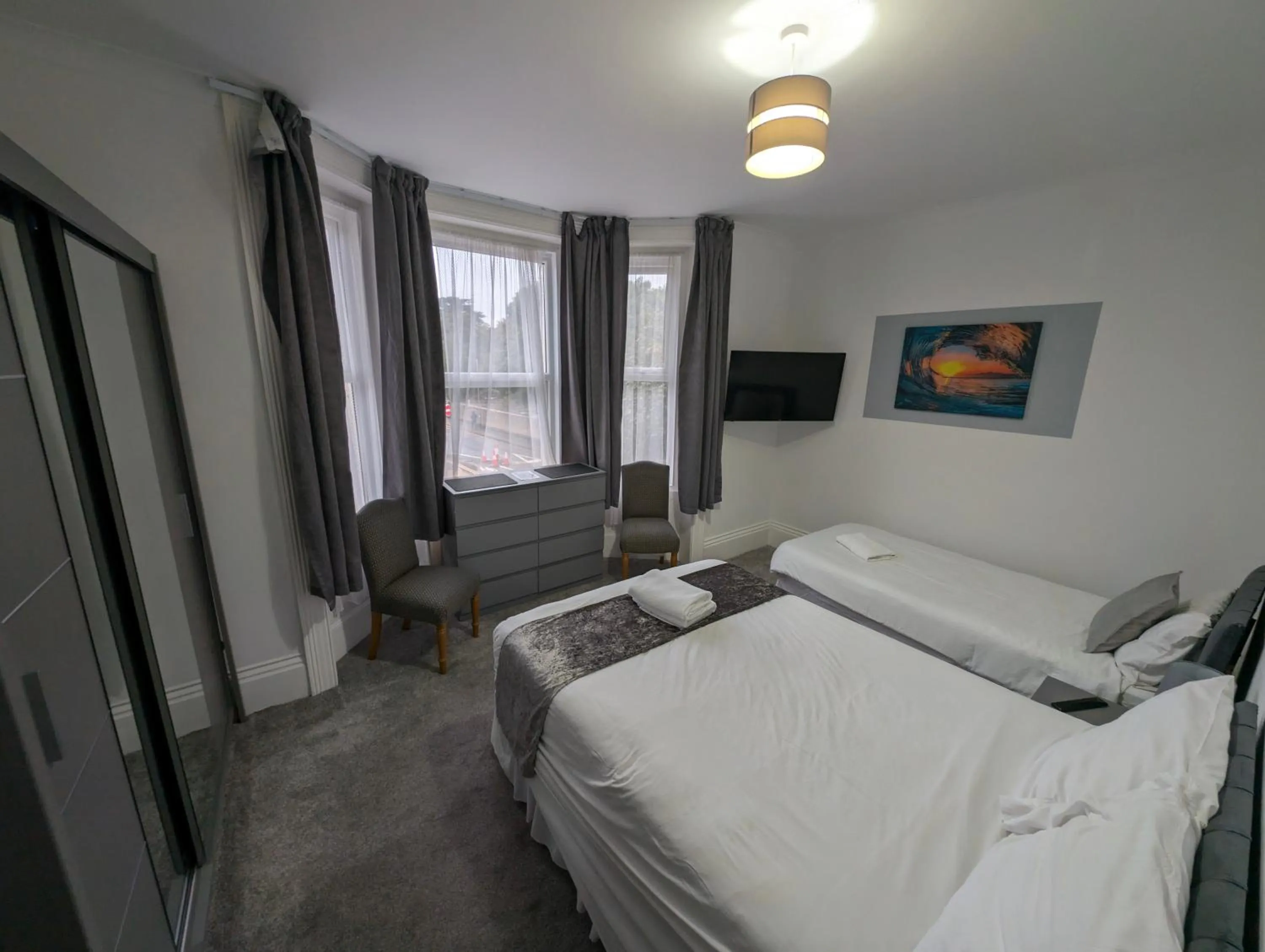 Bed in Cecil Court Hotel