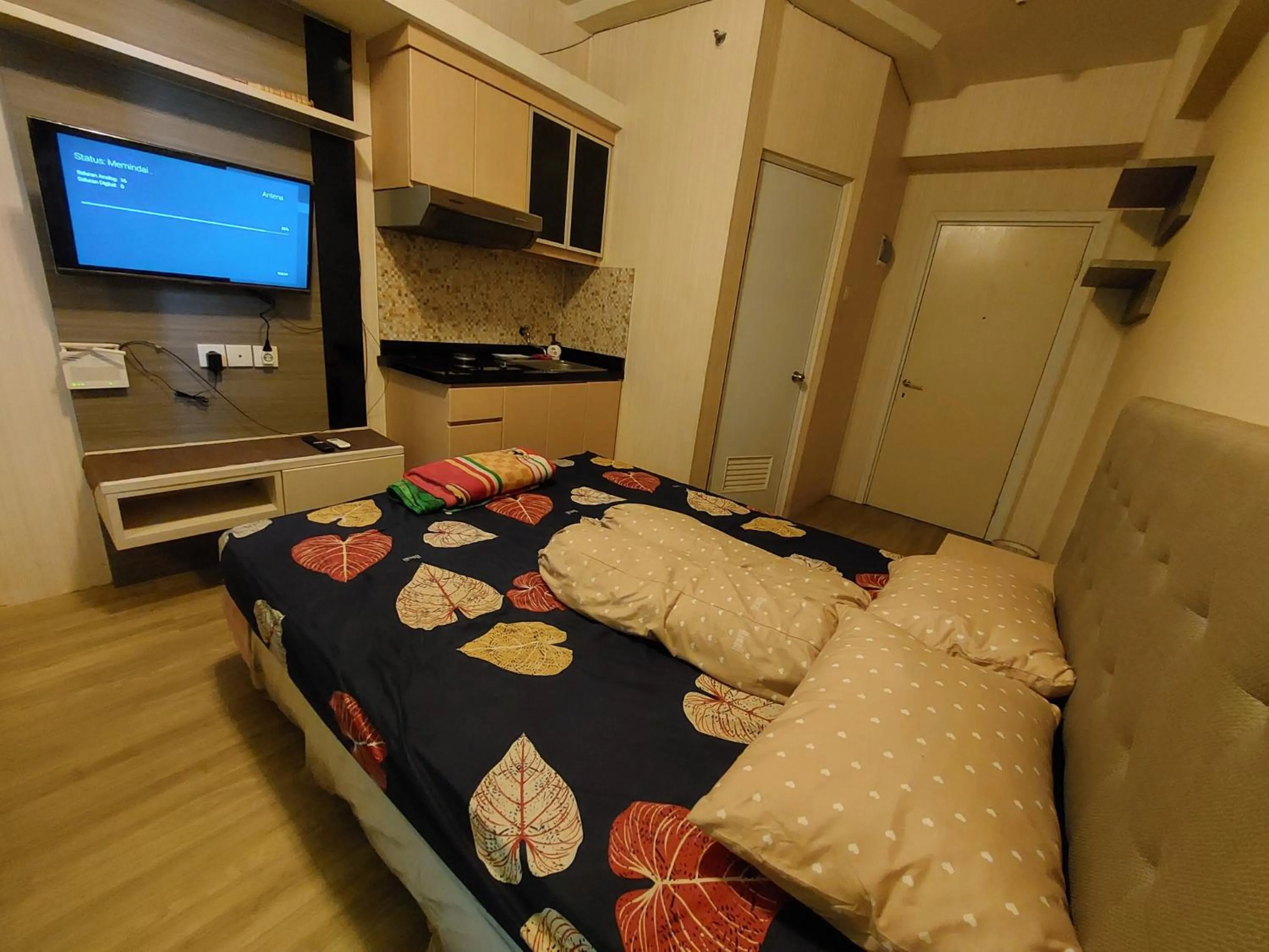 Bed in Green Pramuka Apartement By Vici