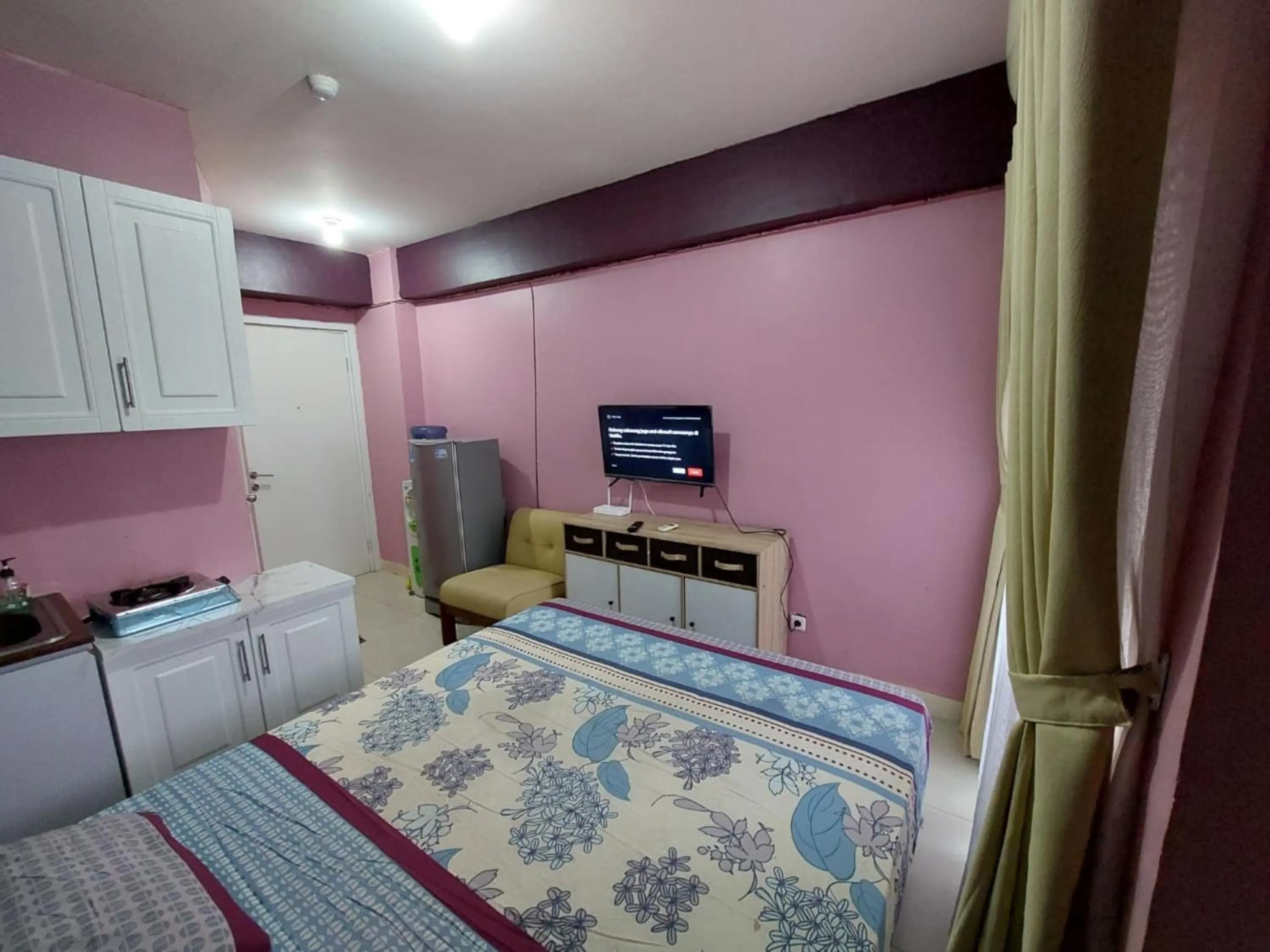 Bed in Green Pramuka Apartement By Vici