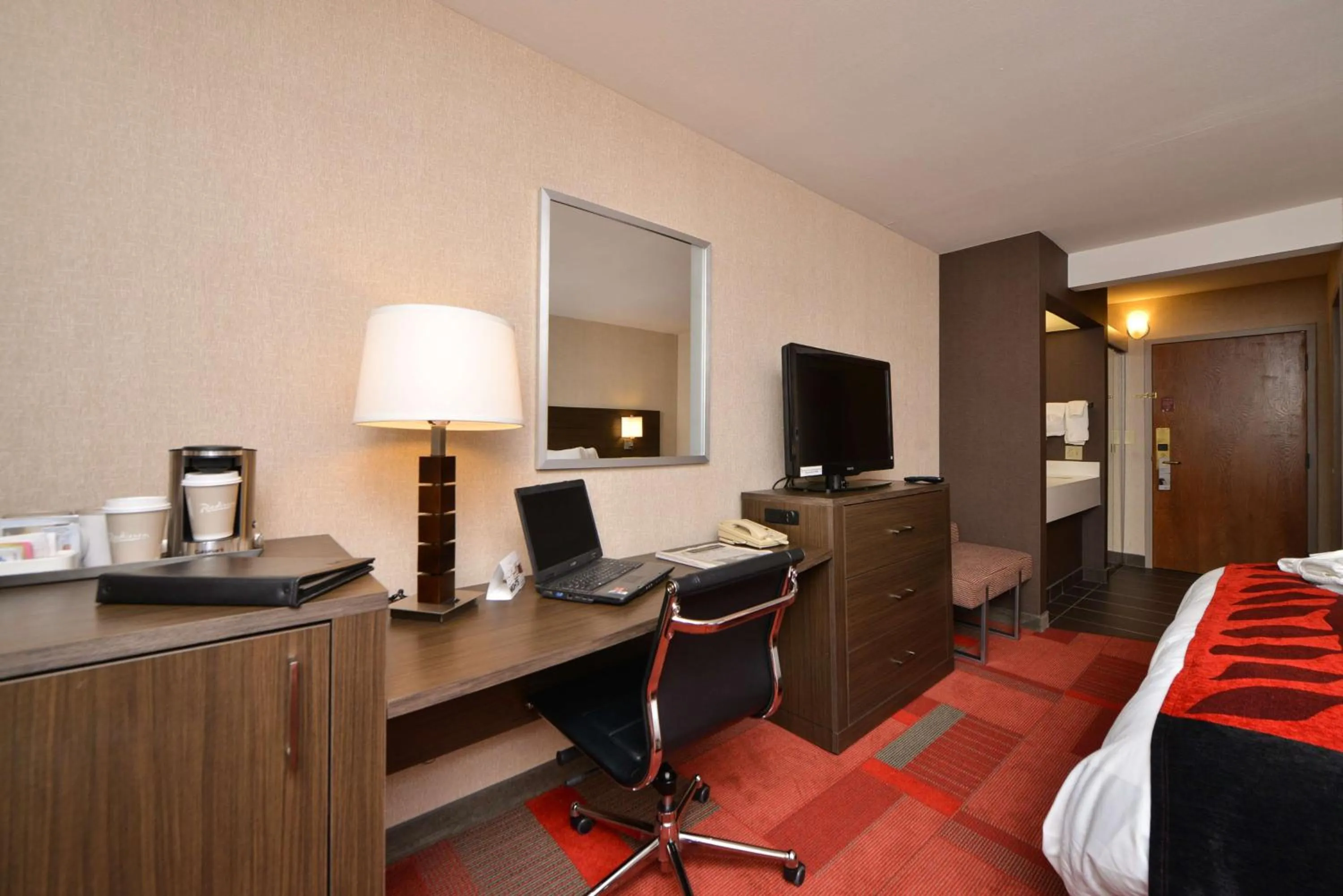 Photo of the whole room, TV/Entertainment Center in Radisson Hotel Madison