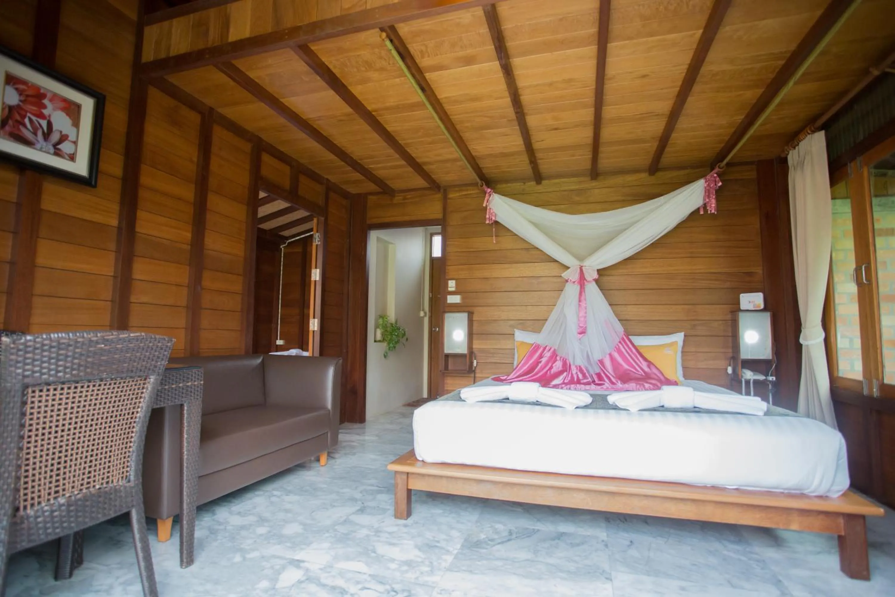Bed in 100 Islands Resort & Spa