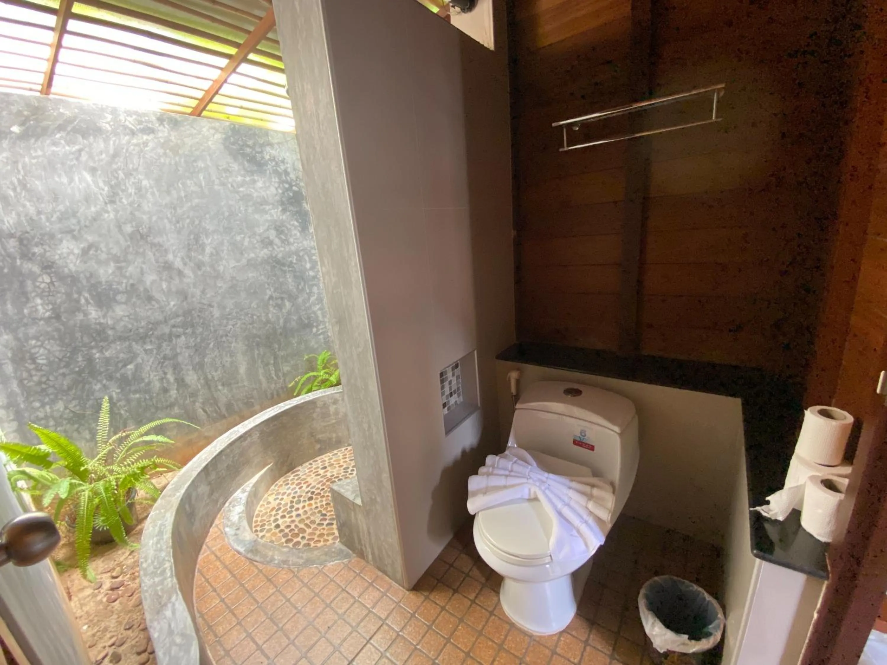 Toilet in 100 Islands Resort & Spa