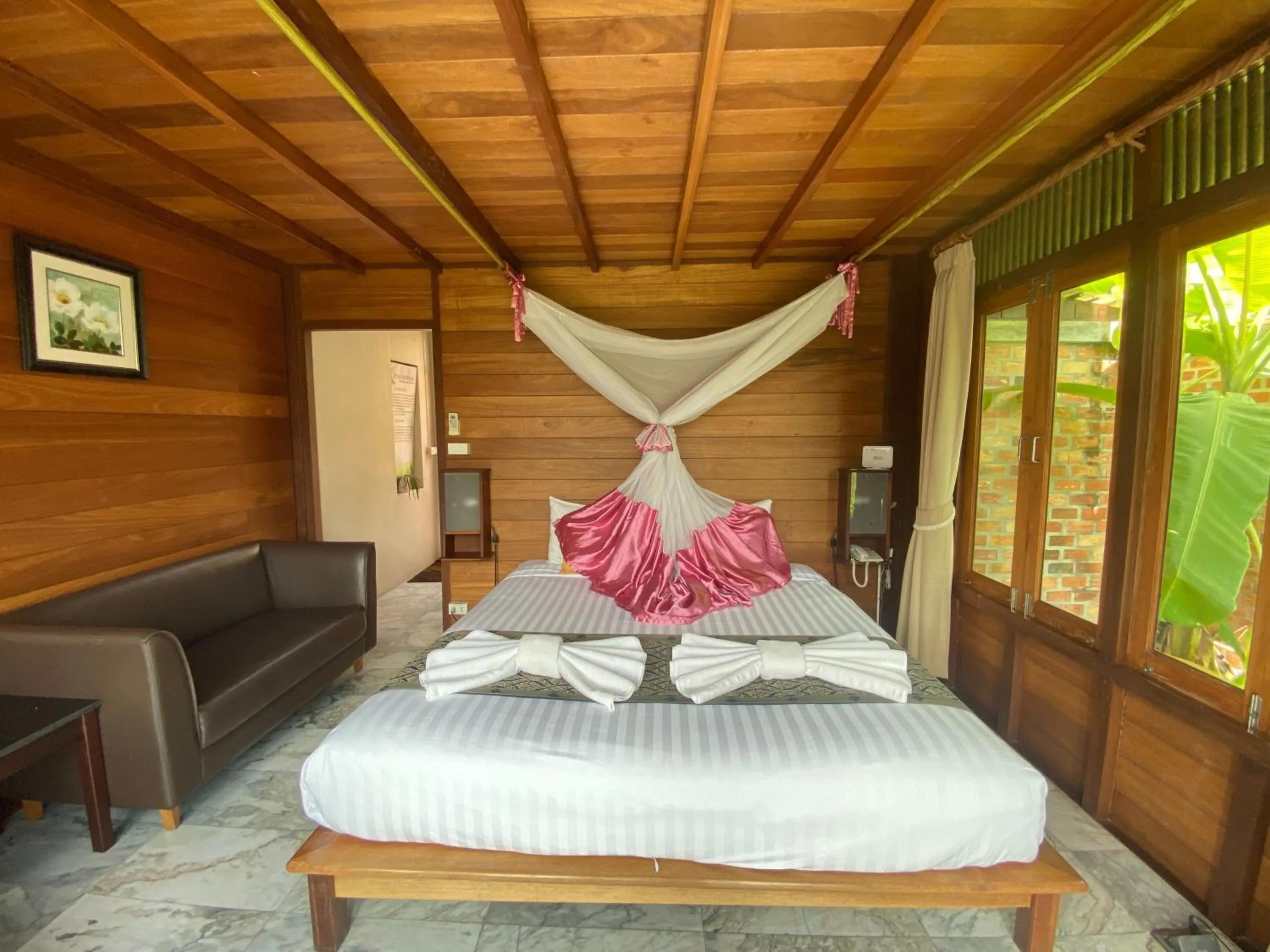 Photo of the whole room, Bed in 100 Islands Resort & Spa