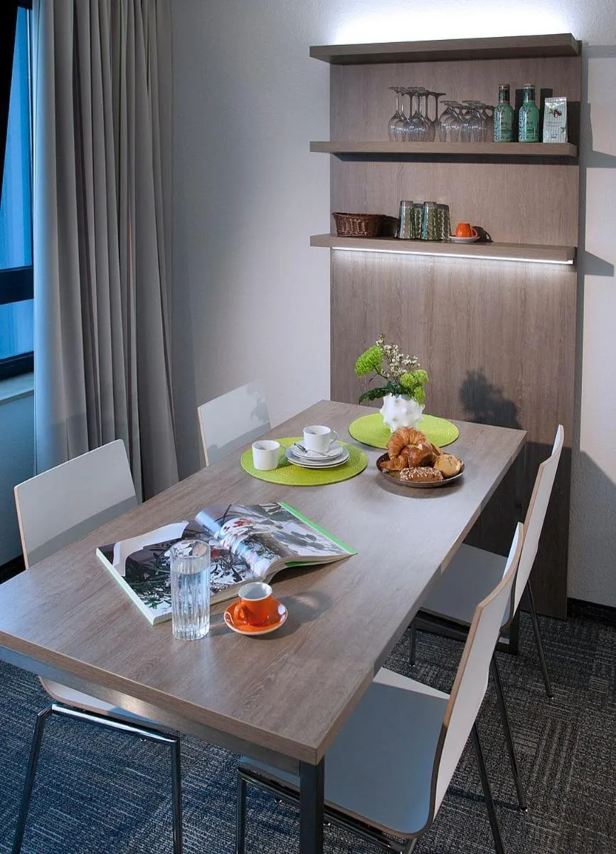 Dining area in Messe Residence by Gerda Good Living - Digital Access