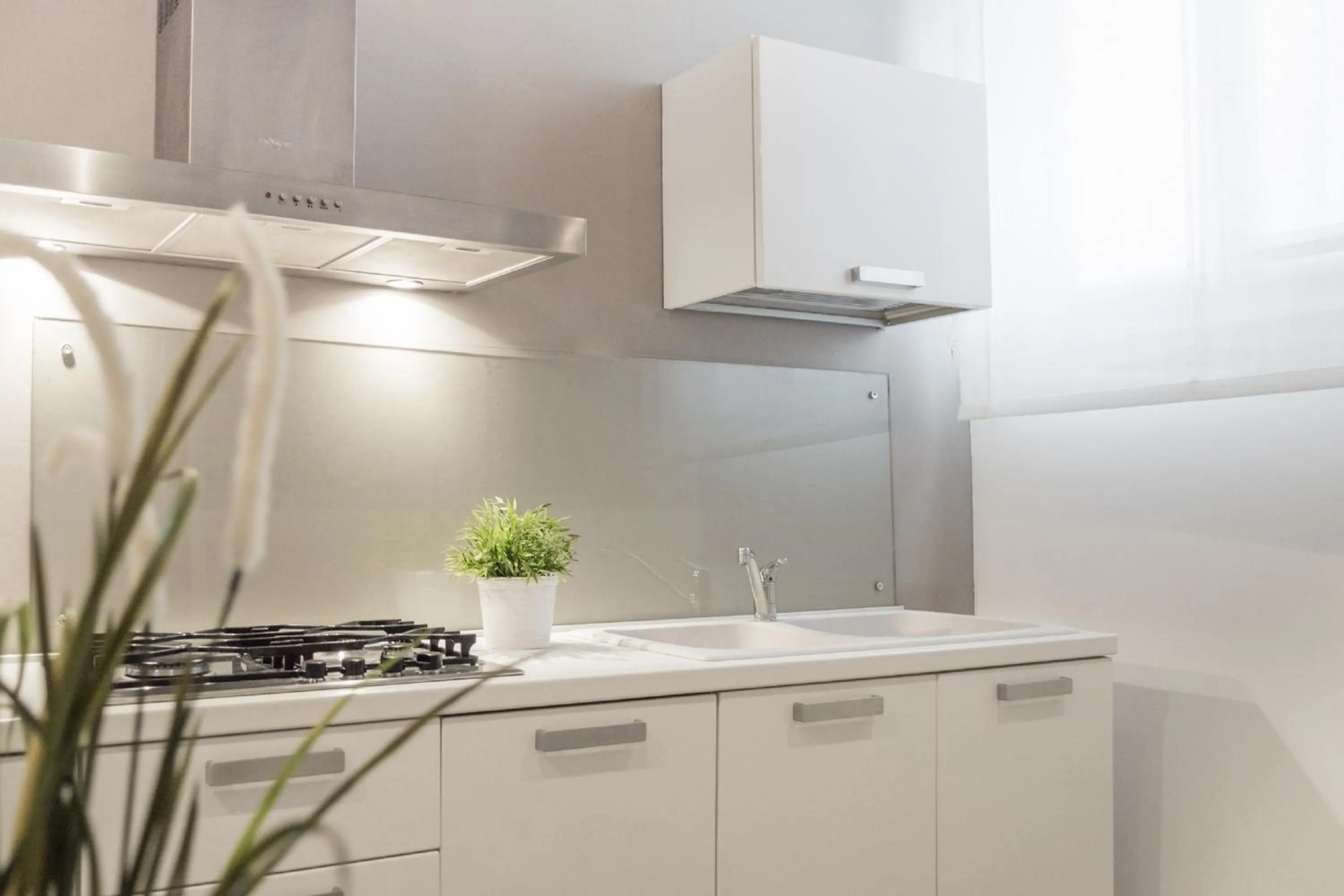 Kitchen or kitchenette in San Polo Design Apartments by Wonderful Italy