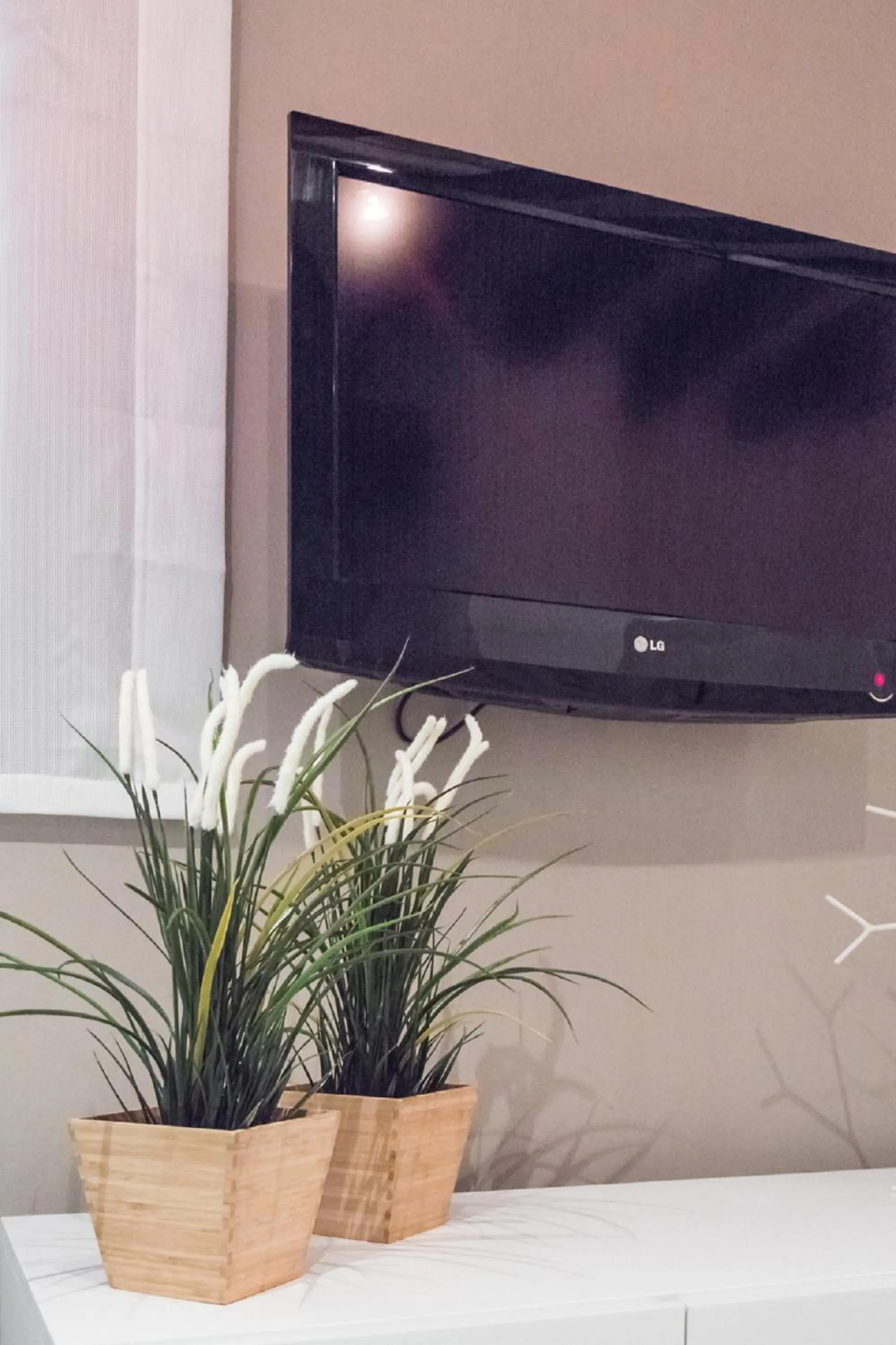 TV and multimedia in San Polo Design Apartments by Wonderful Italy