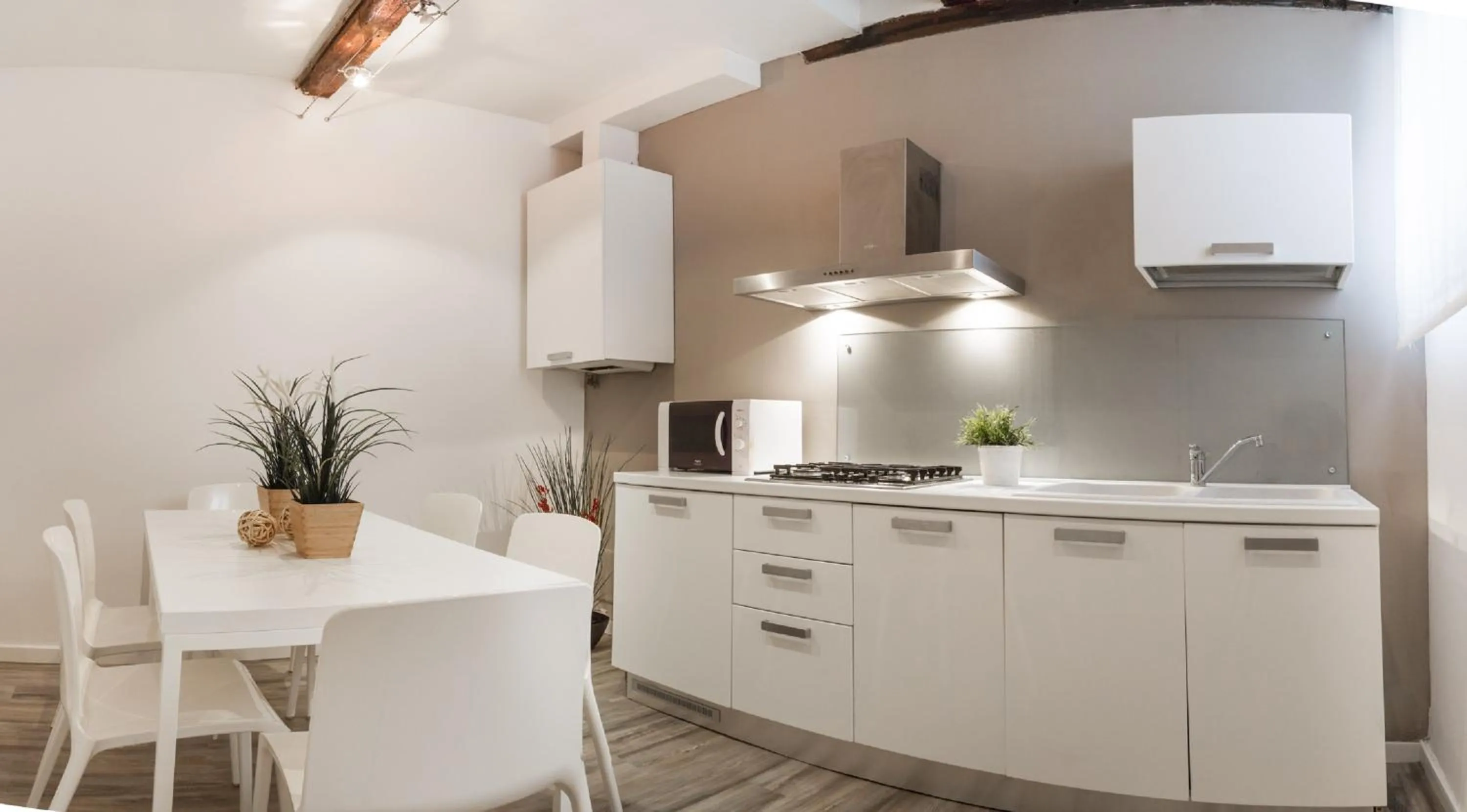 Kitchen or kitchenette in San Polo Design Apartments by Wonderful Italy