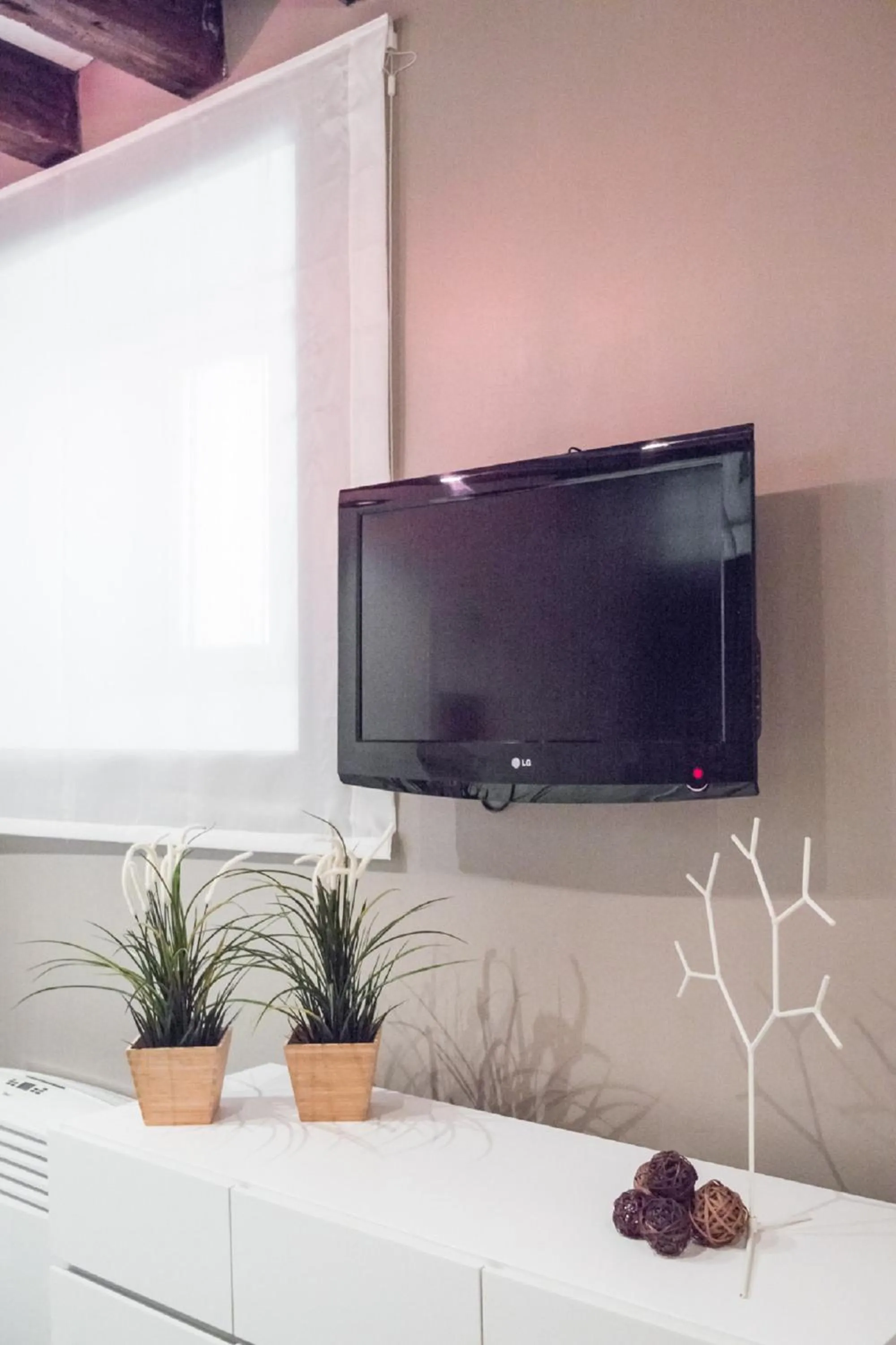 TV and multimedia in San Polo Design Apartments by Wonderful Italy