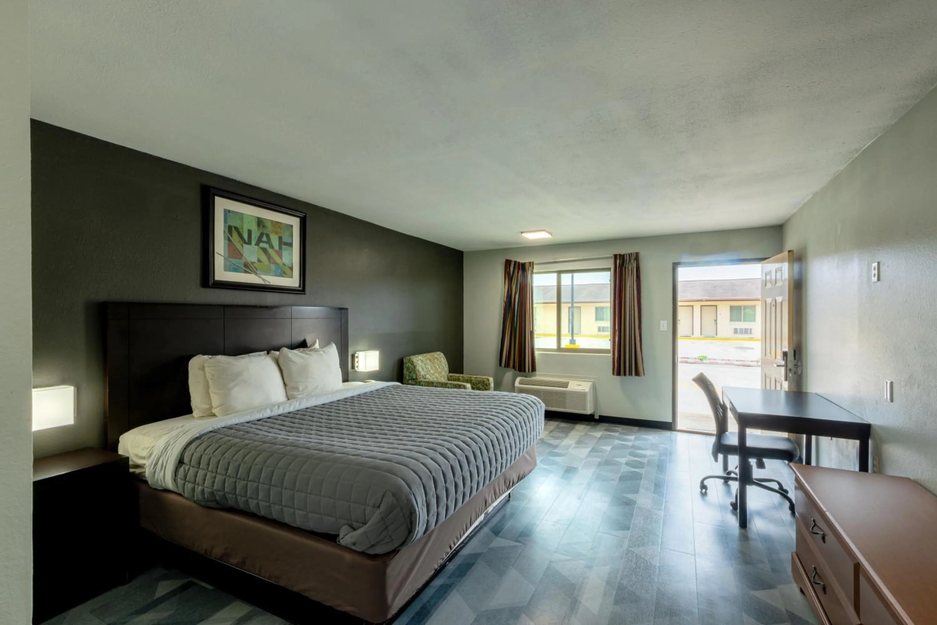 Photo of the whole room, Bed in Freer Executive inn and Studios