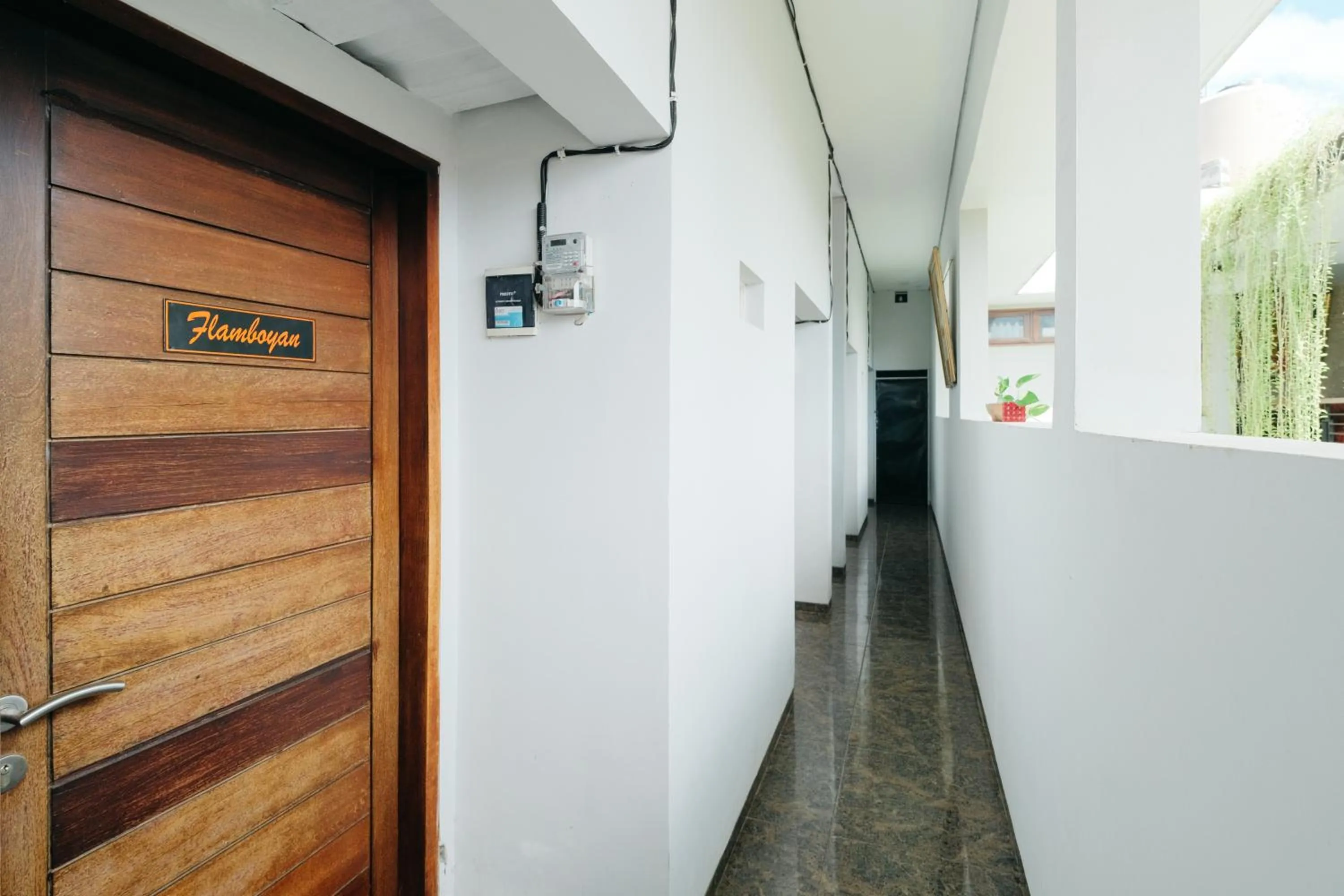 Facade/entrance in D' Tamblingan Guesthouse Jimbaran RedPartner