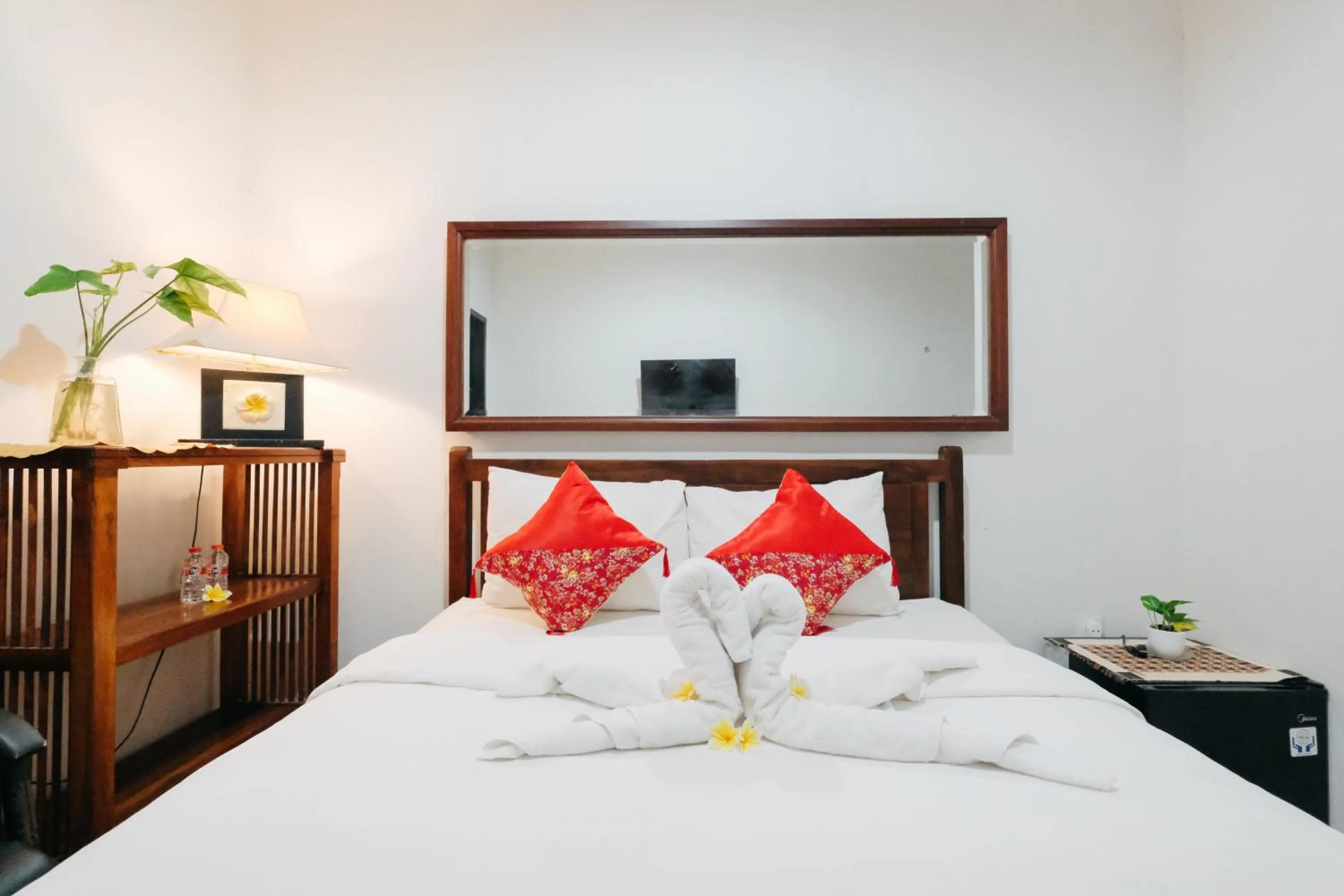 Bed in D' Tamblingan Guesthouse Jimbaran RedPartner