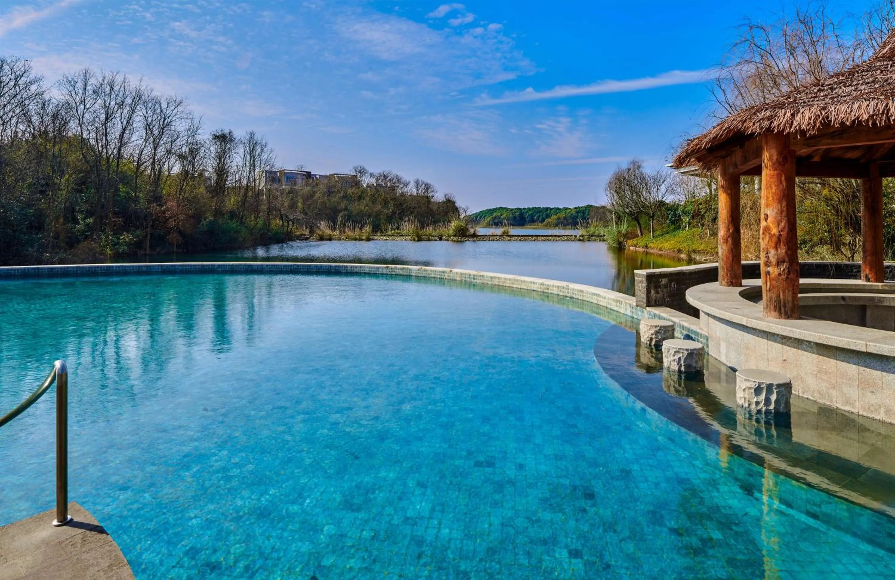 Pool view in Lushan West Sea Resort, Curio Collection by Hilton