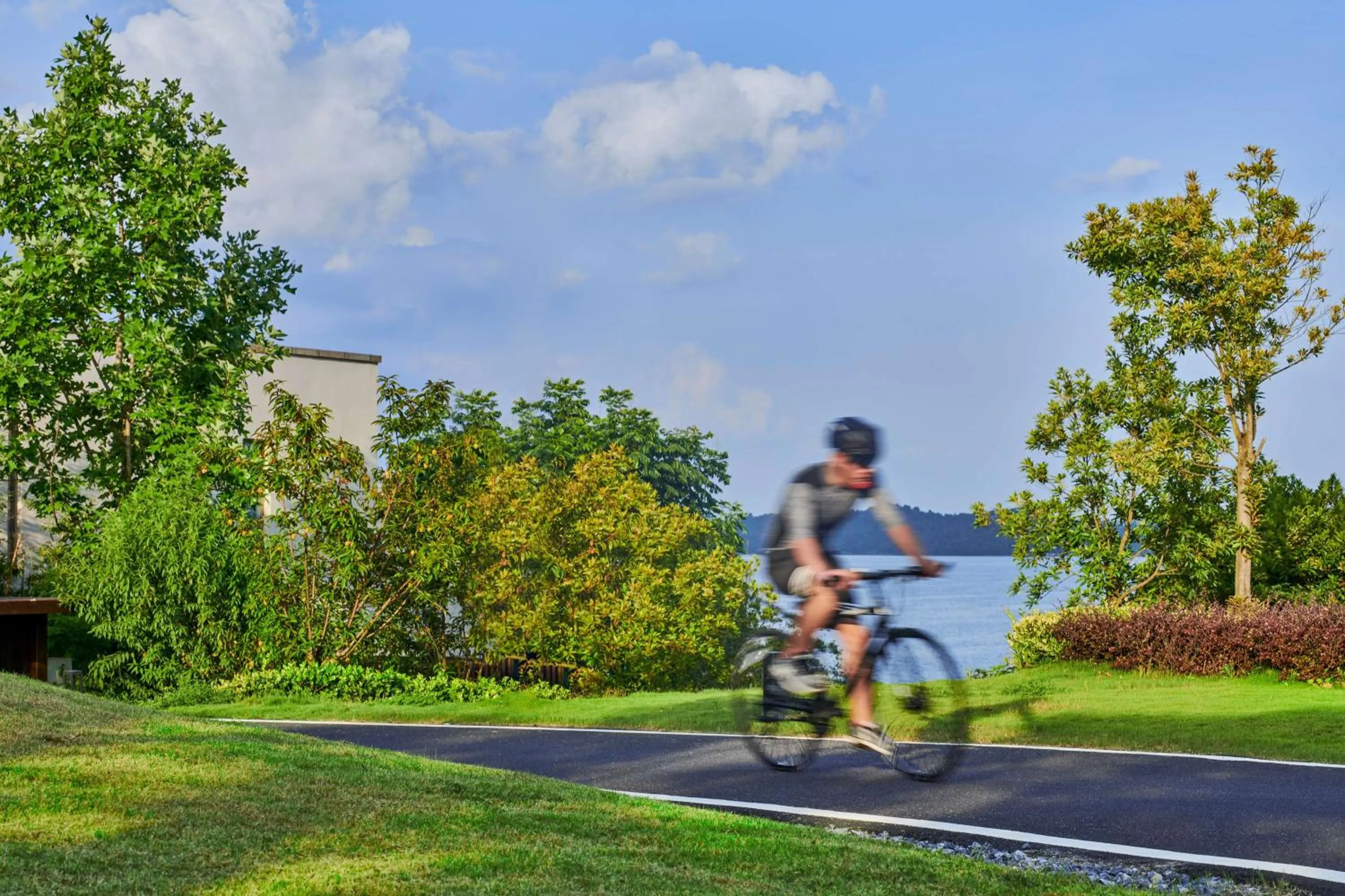 Cycling in Lushan West Sea Resort, Curio Collection by Hilton