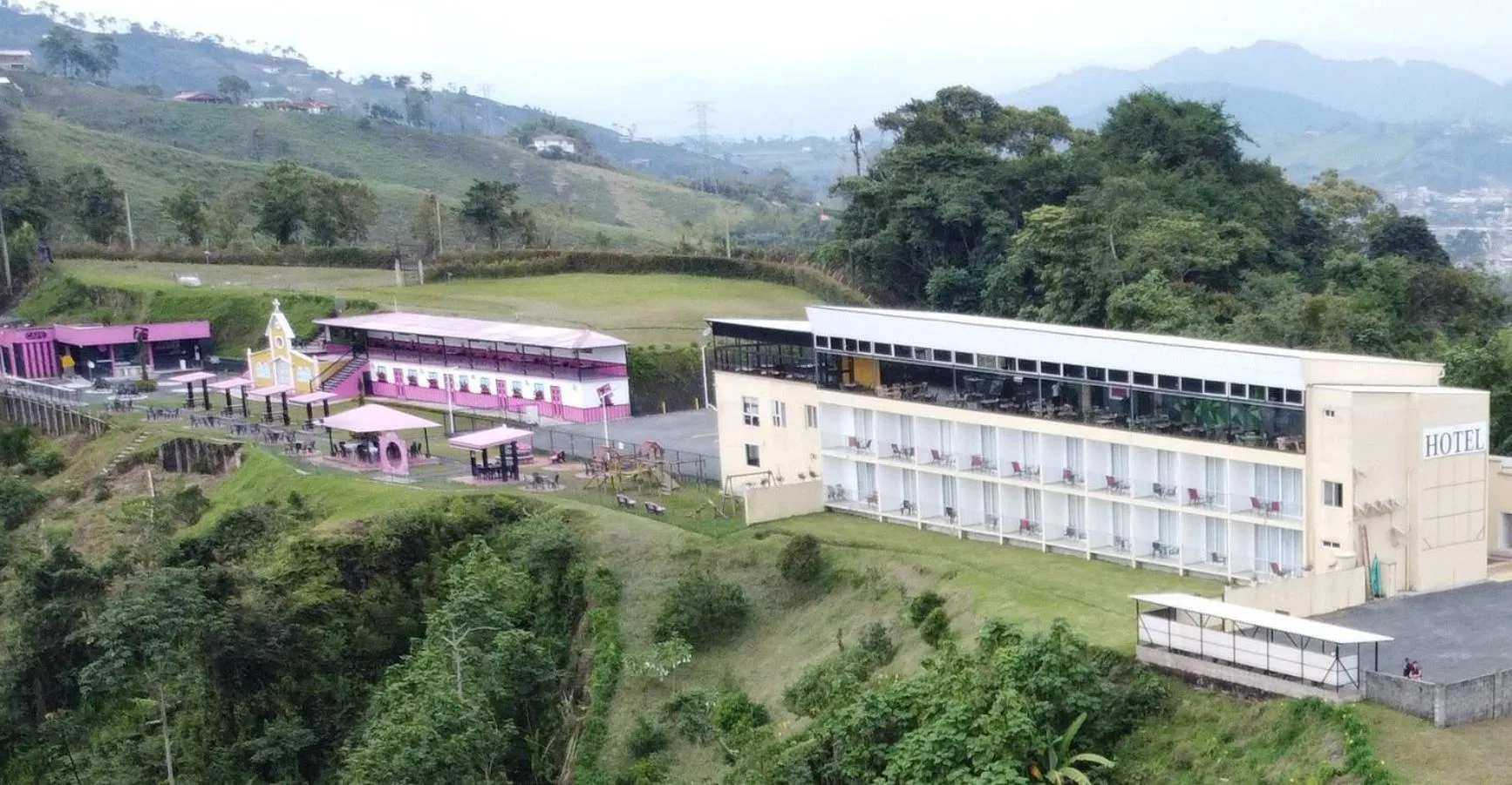 Property building in Hotel Entre Lomas