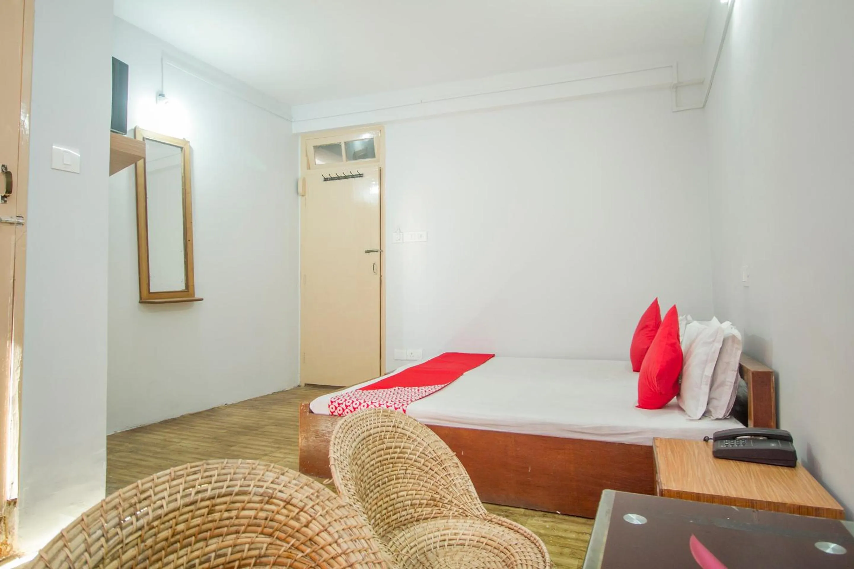 Bedroom in Hotel O Nourpem Residency