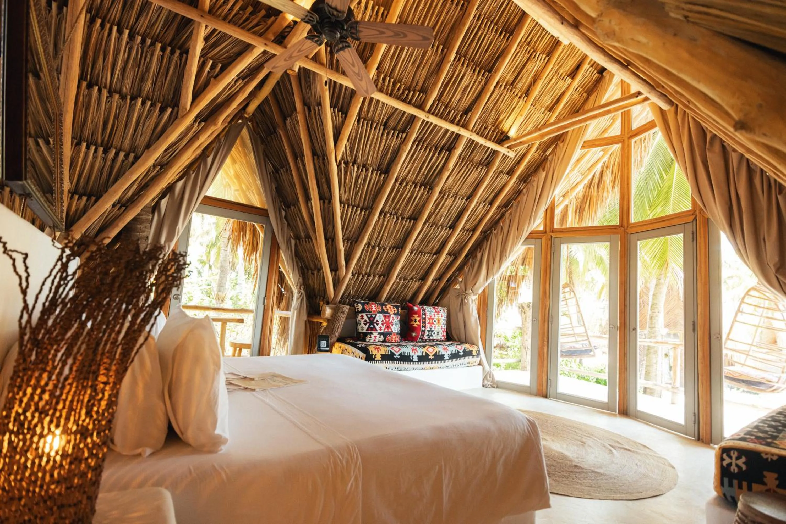 Bed in Éteka Slow Beach Hotel Adults Only