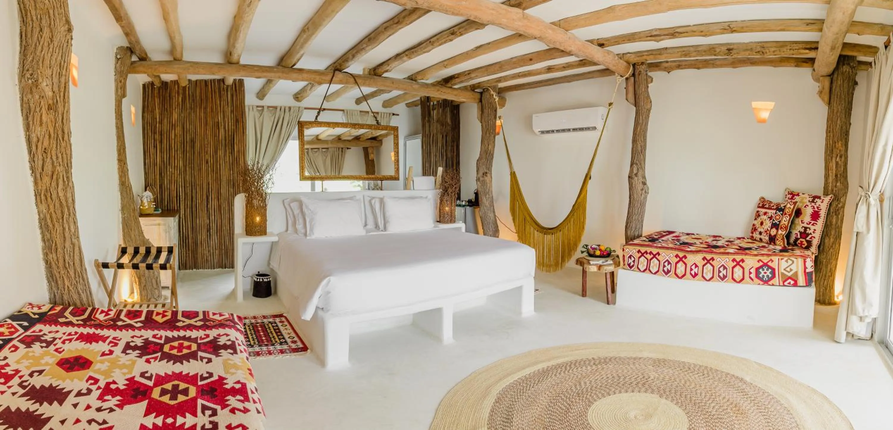 Bed in Éteka Slow Beach Hotel Adults Only