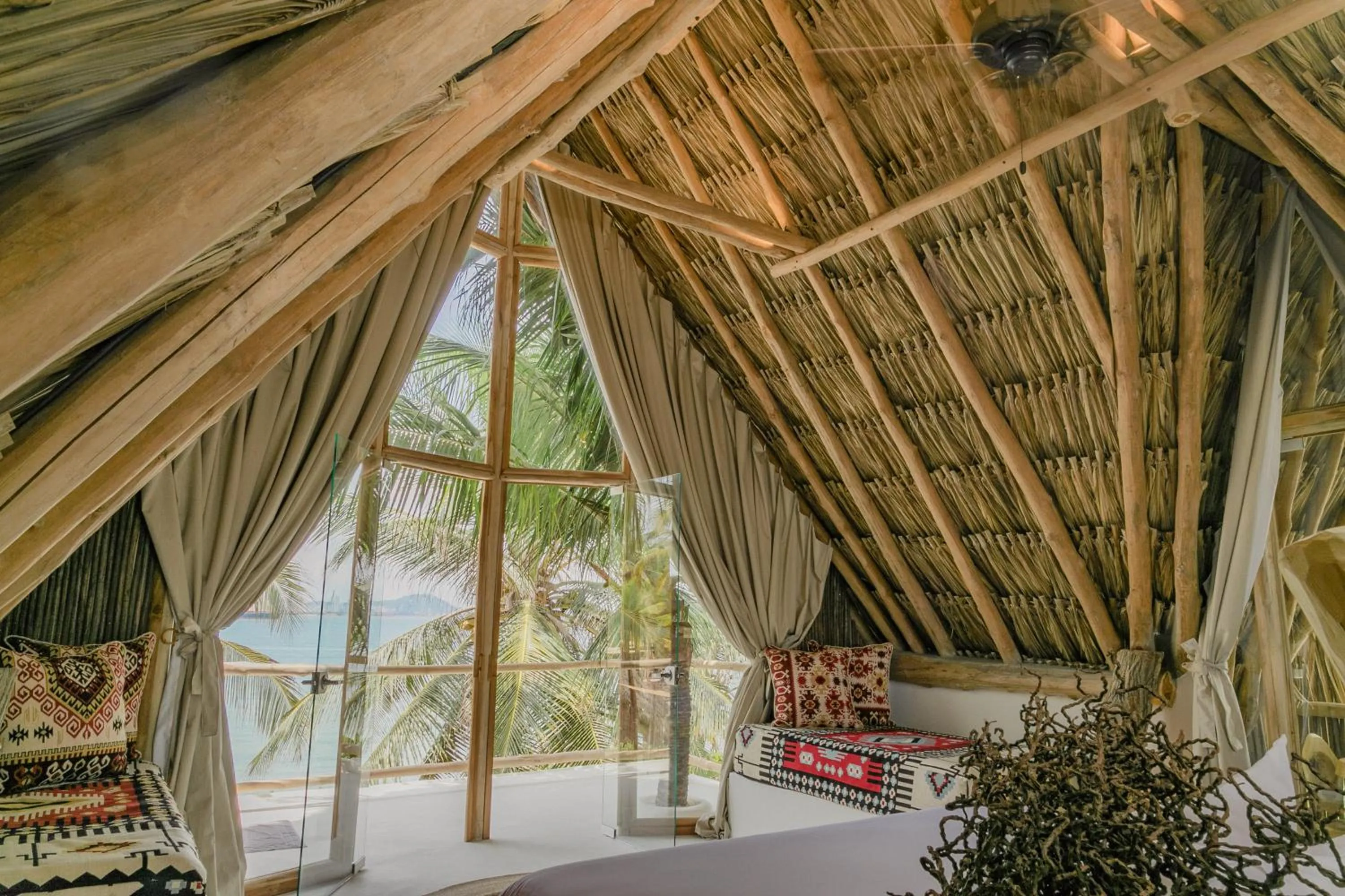 Bed in Éteka Slow Beach Hotel Adults Only