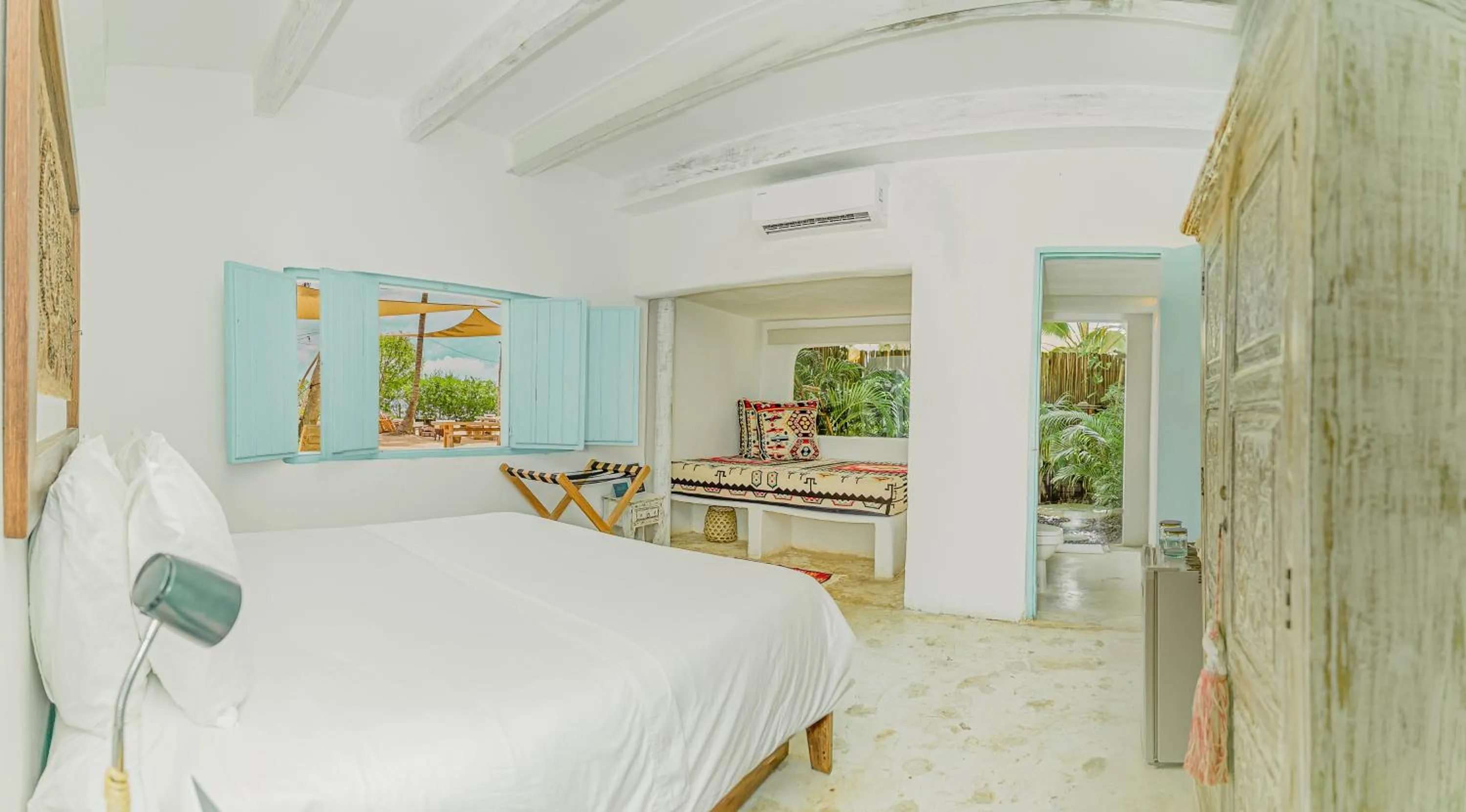 Bed in Éteka Slow Beach Hotel Adults Only