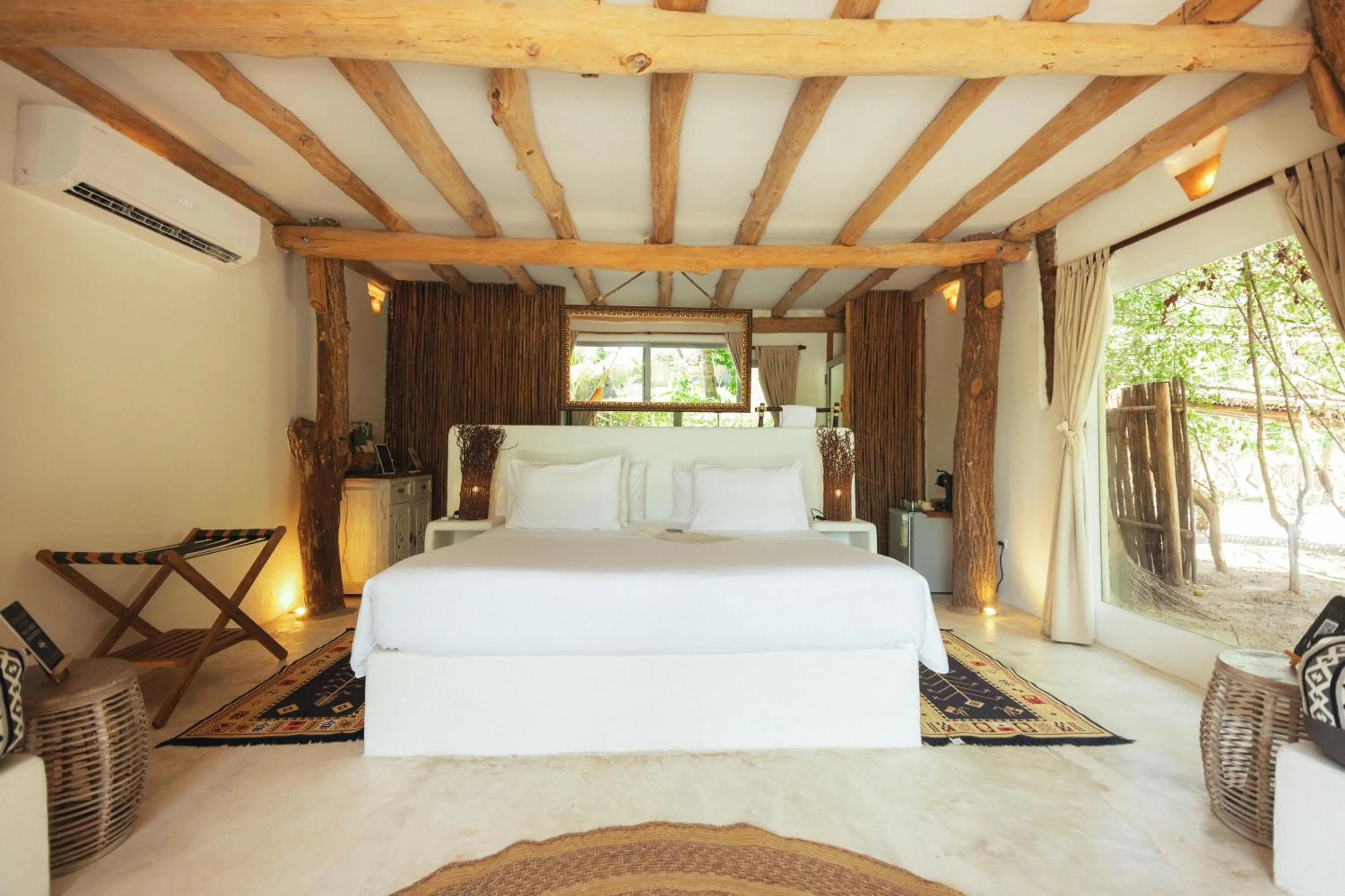 Bed in Éteka Slow Beach Hotel Adults Only