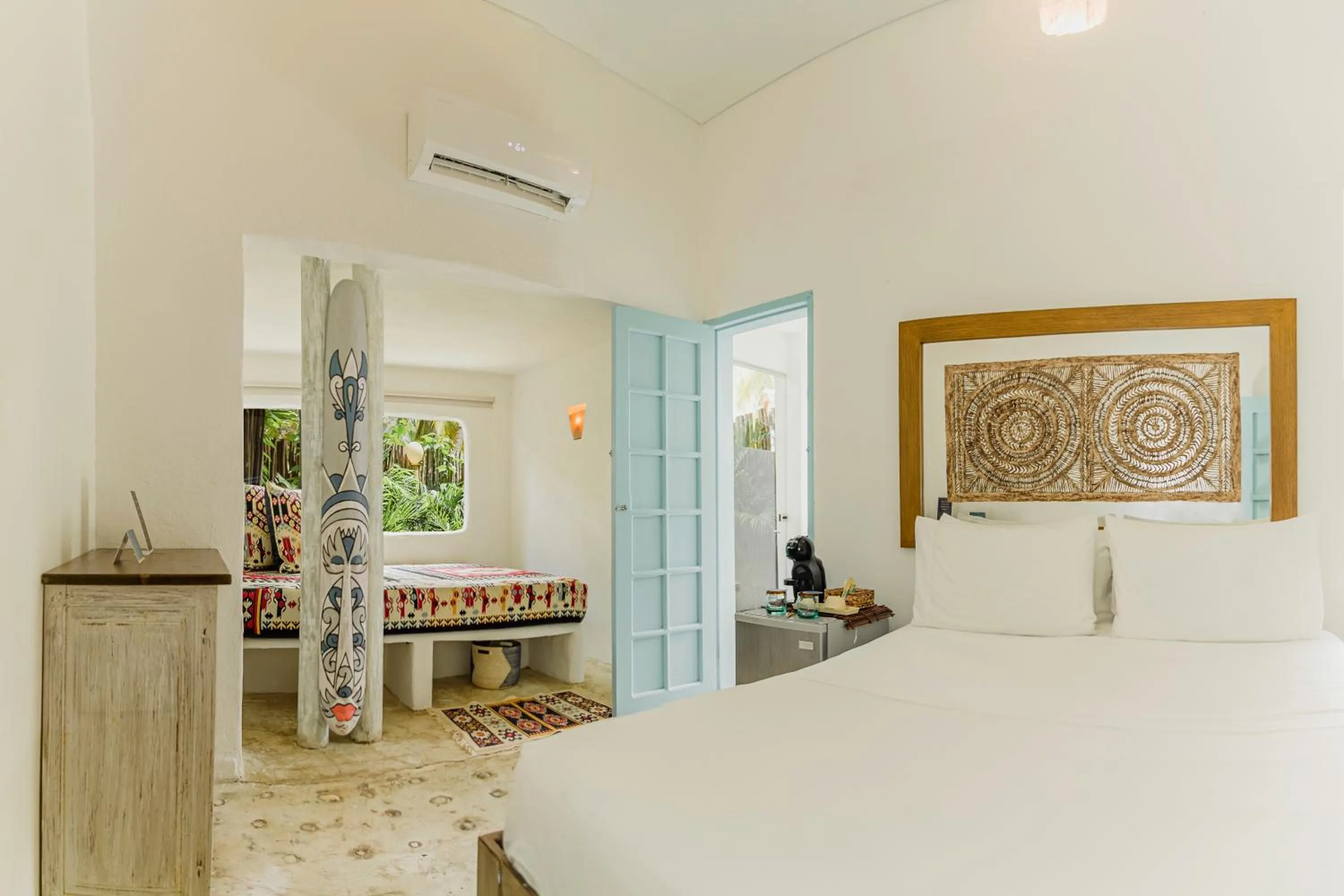 Bed in Éteka Slow Beach Hotel Adults Only