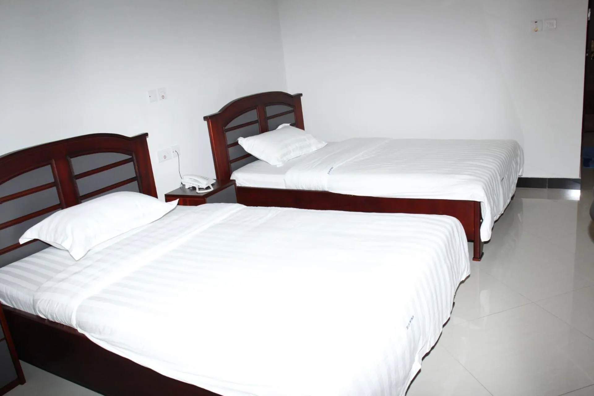 Bed in Kenlon Hotel Kampala