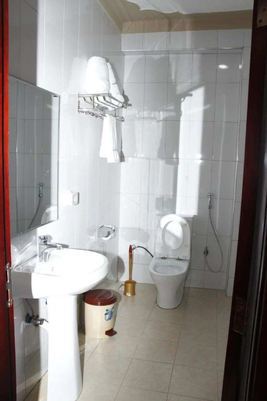 Toilet in Kenlon Hotel Kampala