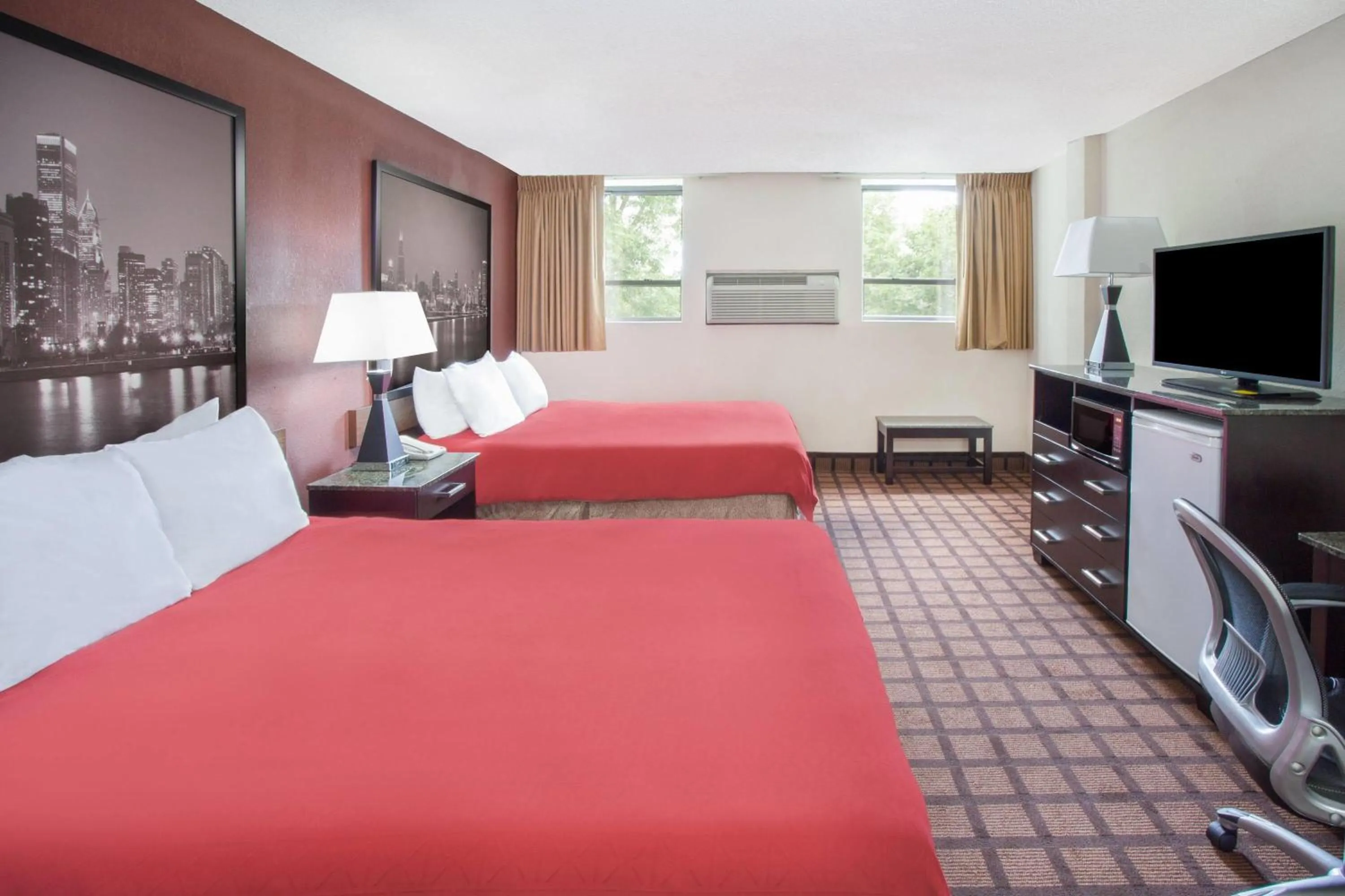 Photo of the whole room, Bed in Super 8 by Wyndham Chicago IL