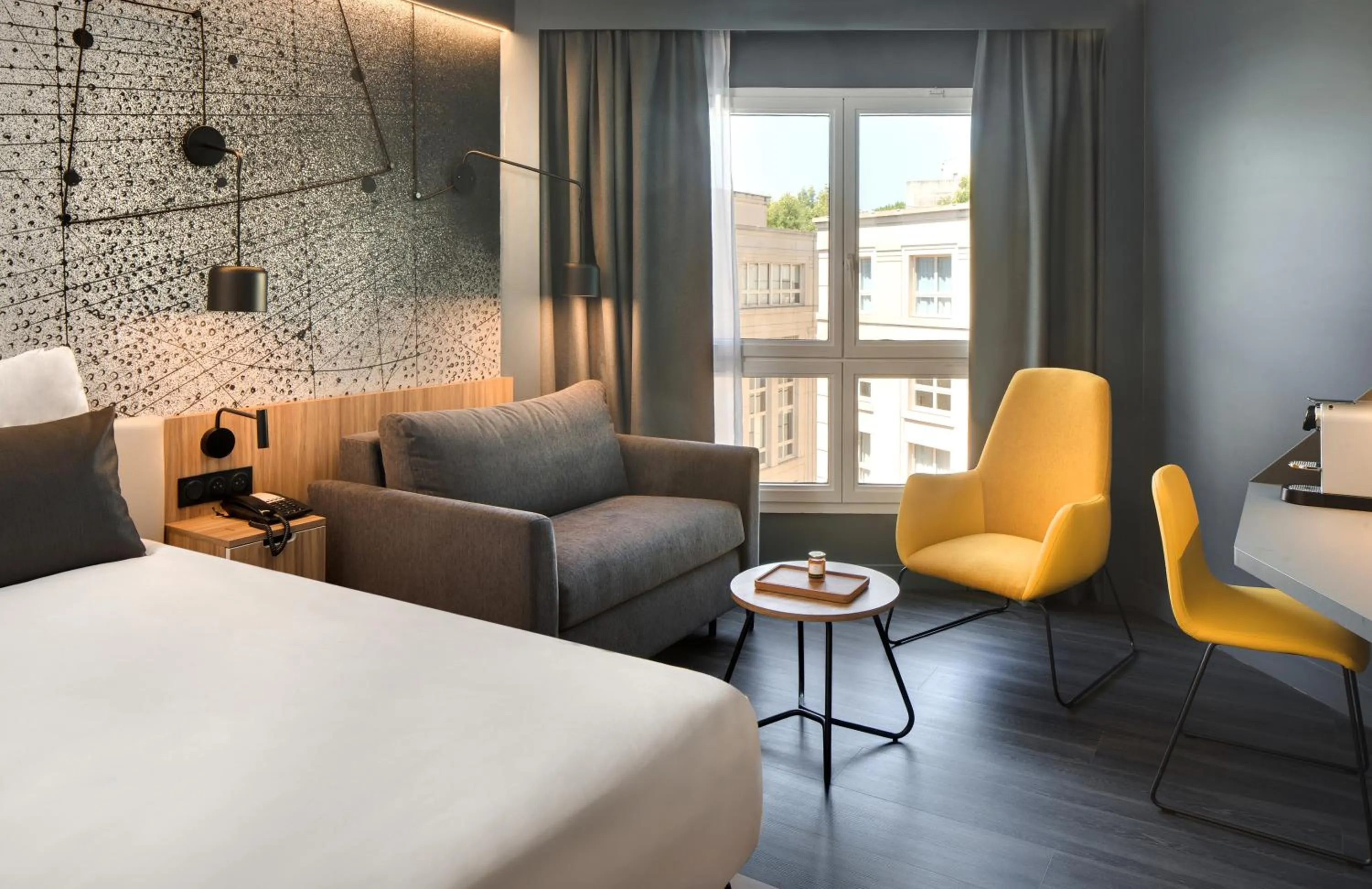 Photo of the whole room, Bed in Mercure Montpellier Centre Antigone