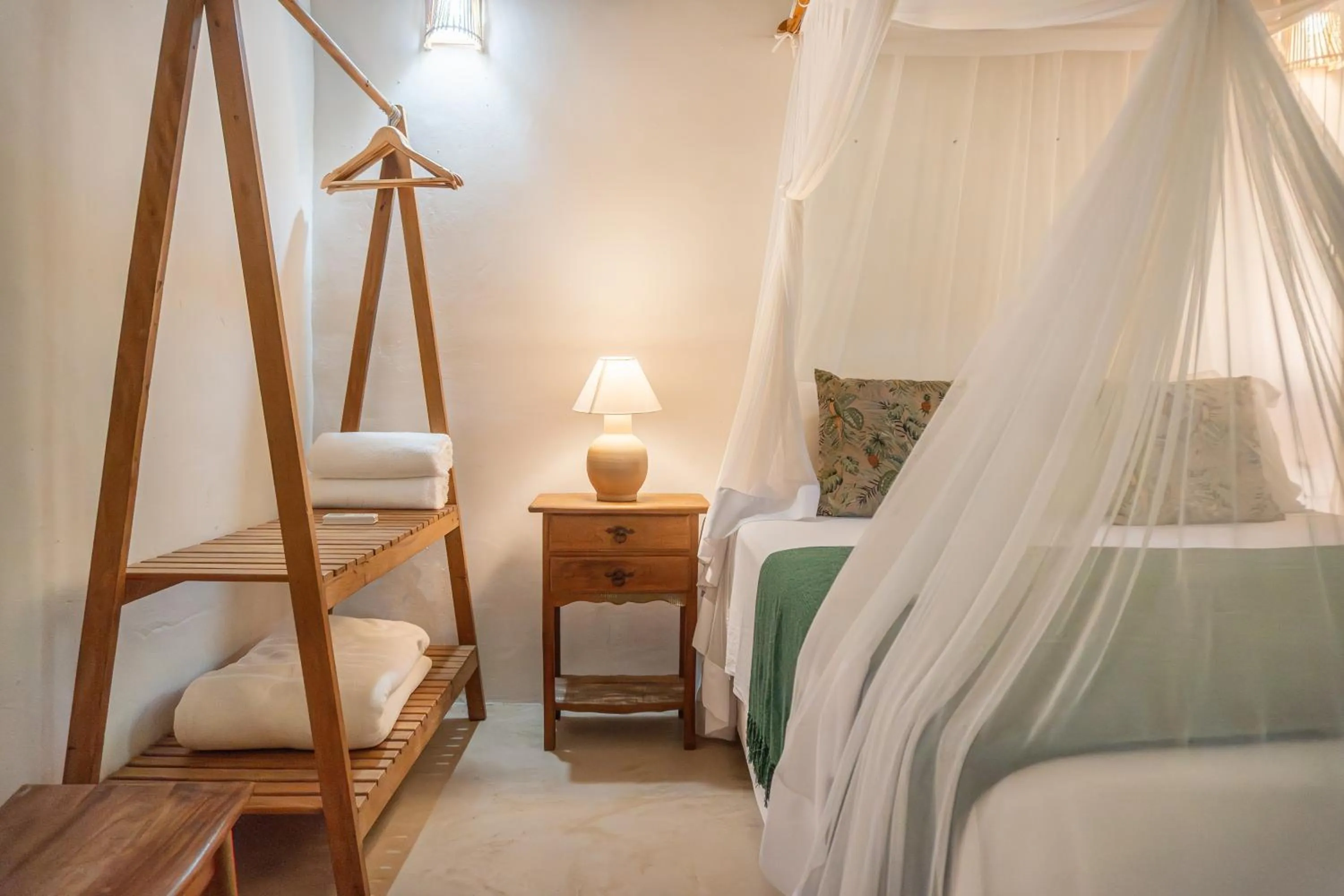 Bed in POUSADA CARMELITHA