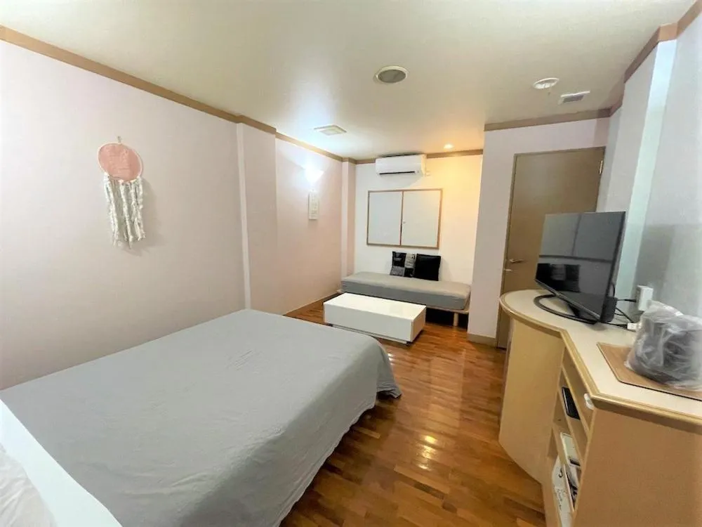 Photo of the whole room, Bed in Hotel bin